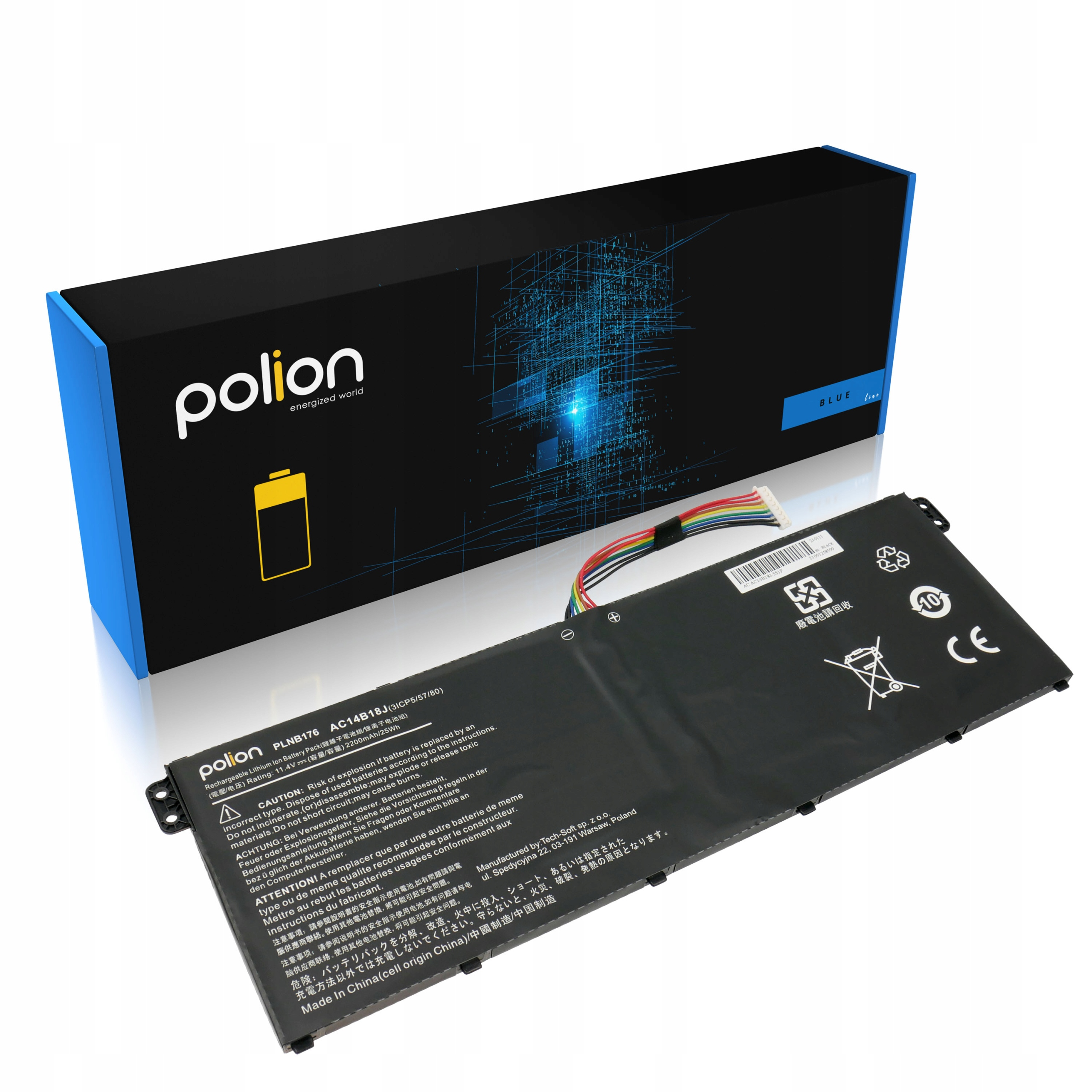 Czarna bateria do laptopa leży przed pudełkiem w niebiesko-niebieskim wzorze.