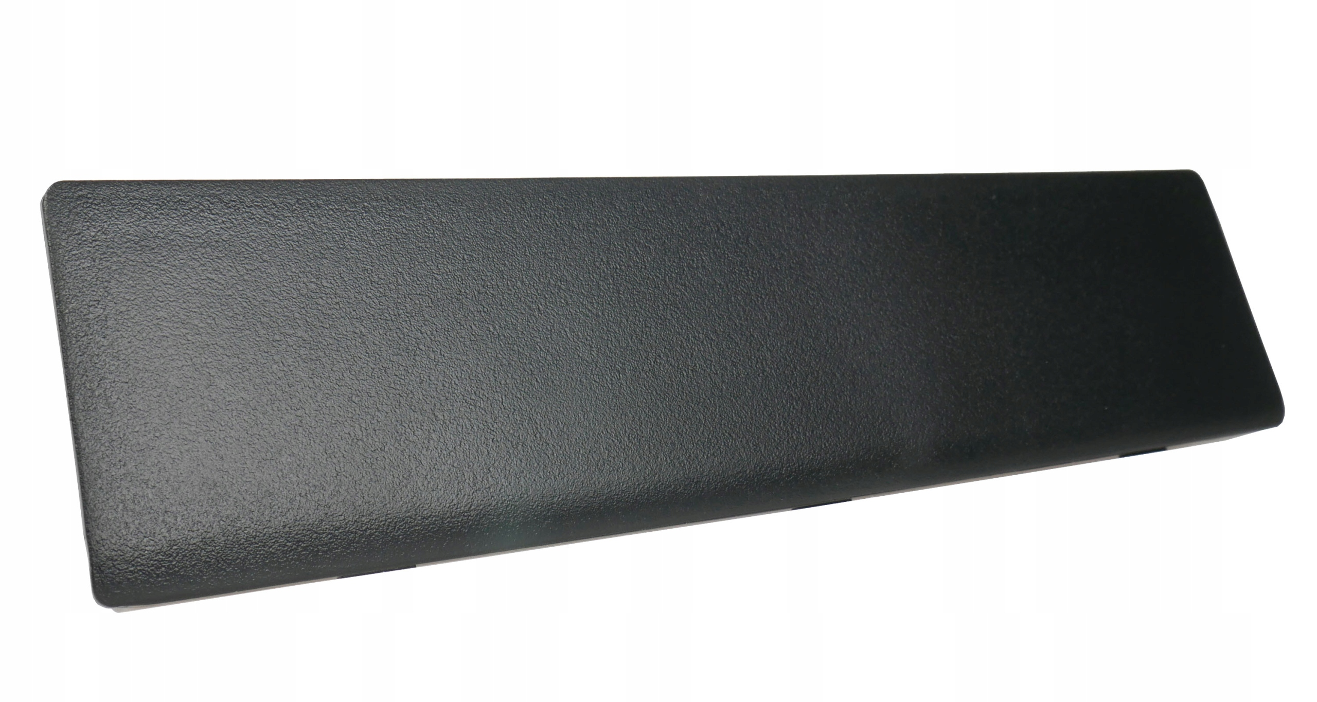 Czarny, teksturowany prostokąt z zaokrąglonymi rogami na białym tle.