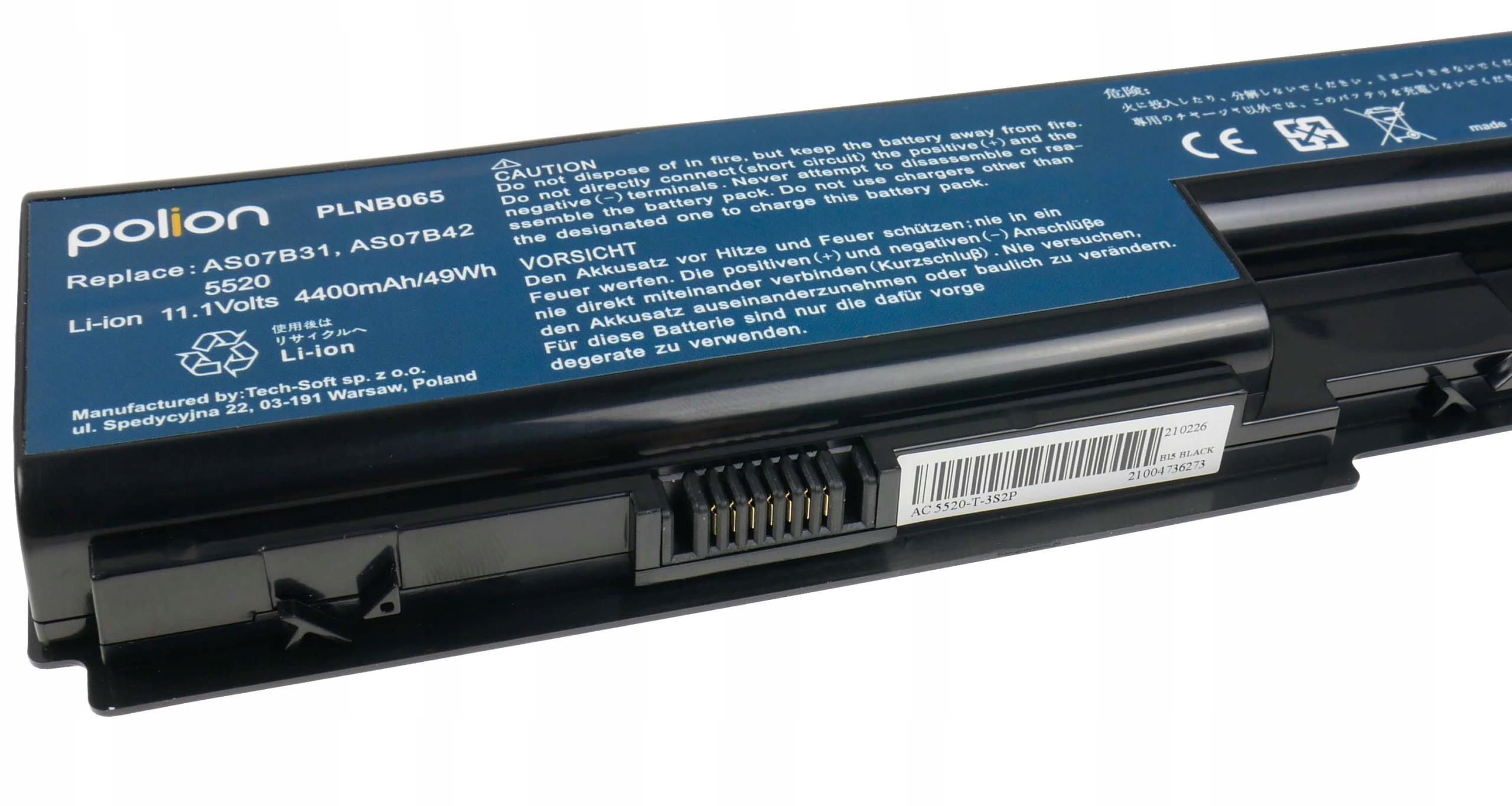 Czarna bateria laptopa Polion Li-ion ze specyfikacjami i ostrzeżeniami.