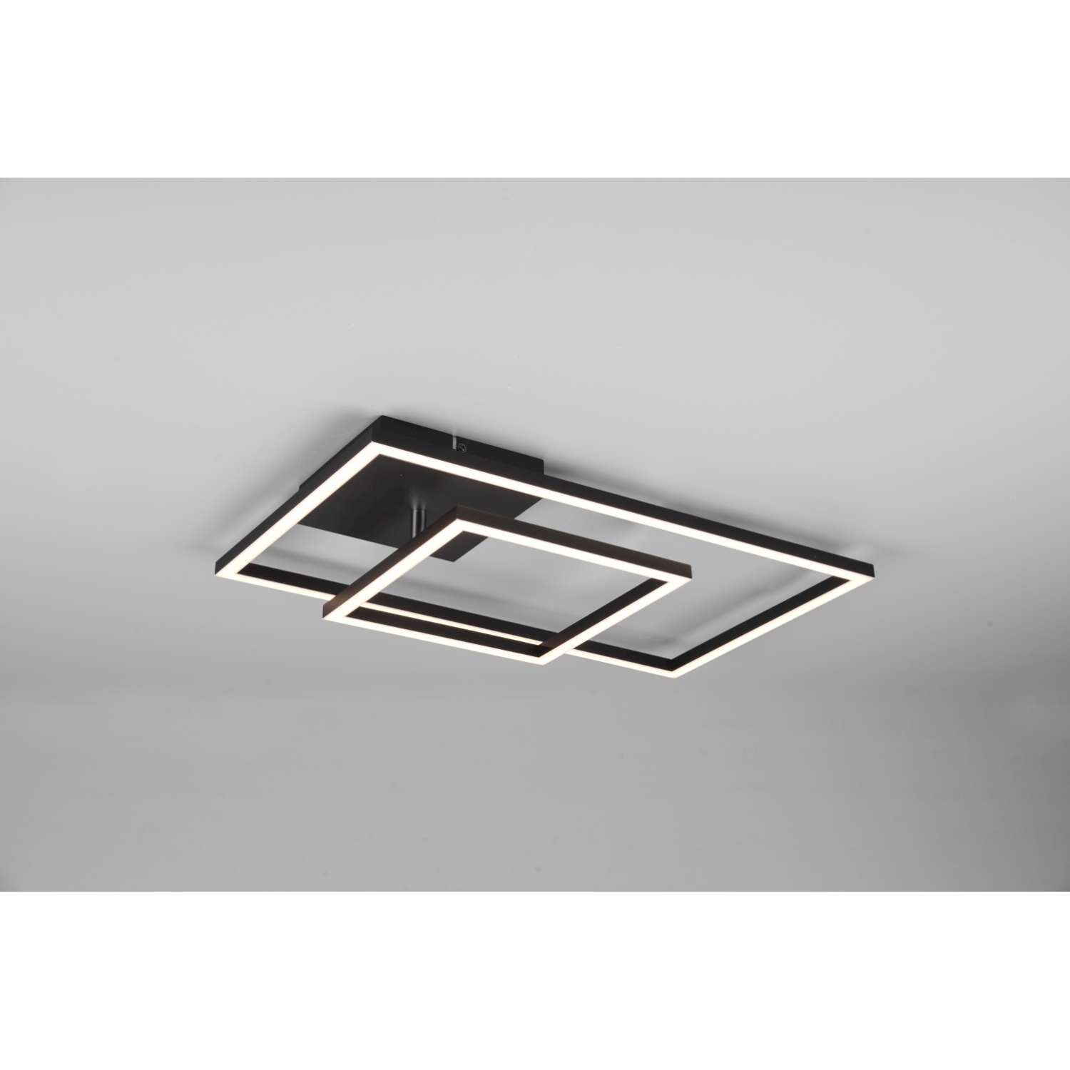 Lampada da soffitto nera con due cornici quadrate sovrapposte e illuminazione a LED bianca.