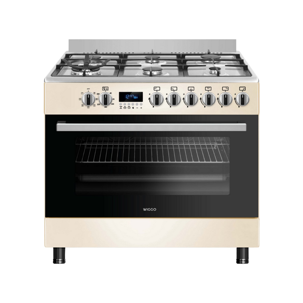 A cream-colored gas stove with four burners and an oven with a black glass door.
