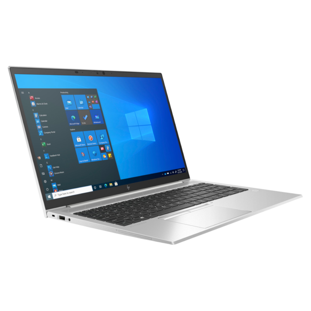 Un ordinateur portable argenté avec l'écran ouvert, affichant le menu Démarrer de Windows.