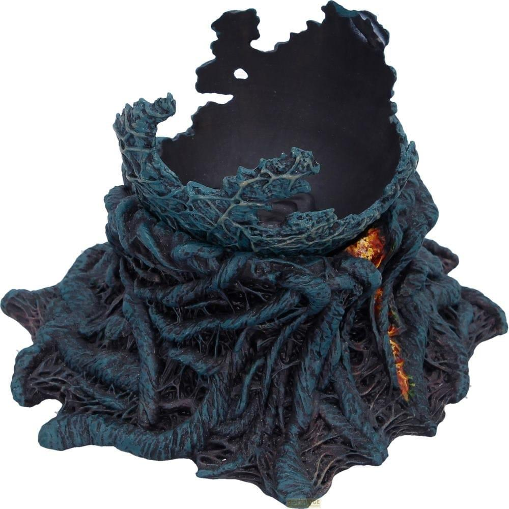 Dunkles, zerklüftetes Objekt mit blauen und schwarzen Details, die an Wurzeln oder Tentakel erinnern.
