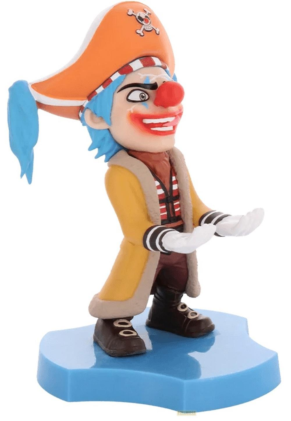 Eine Figur mit blauen Haaren, Clown-Make-up und einem orangefarbenen Hut mit Totenkopf-Symbol.