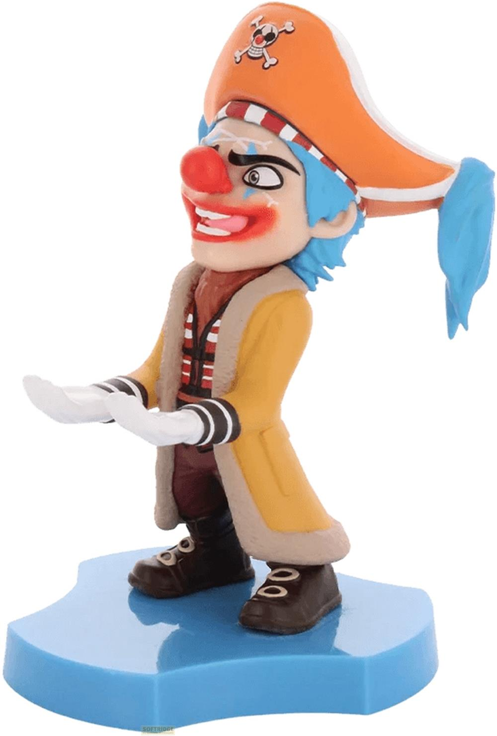 Figur eines Clowns mit blauen Haaren, gelber Jacke und orangefarbener Mütze mit Totenkopf.