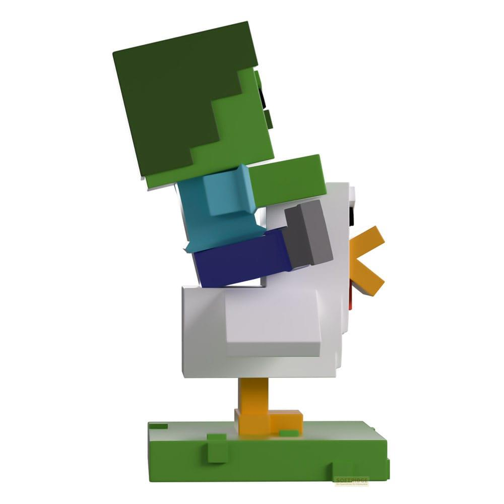 Minecraft-Zombie-Figur reitet auf einem weißen Minecraft-Huhn auf grüner Basis.