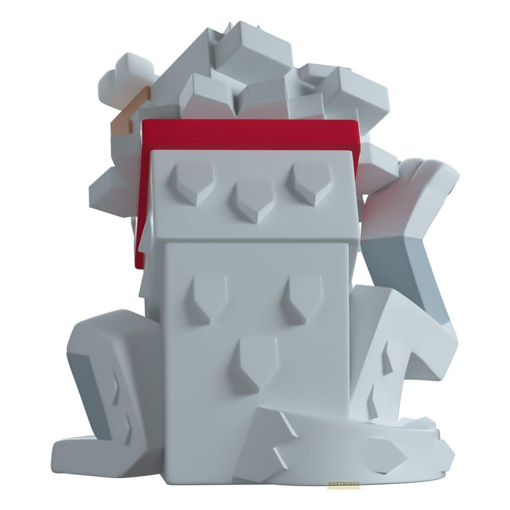 Ein weißes, blockartiges Gebäude mit rotem Dach und grauen Akzenten auf weißem Hintergrund.