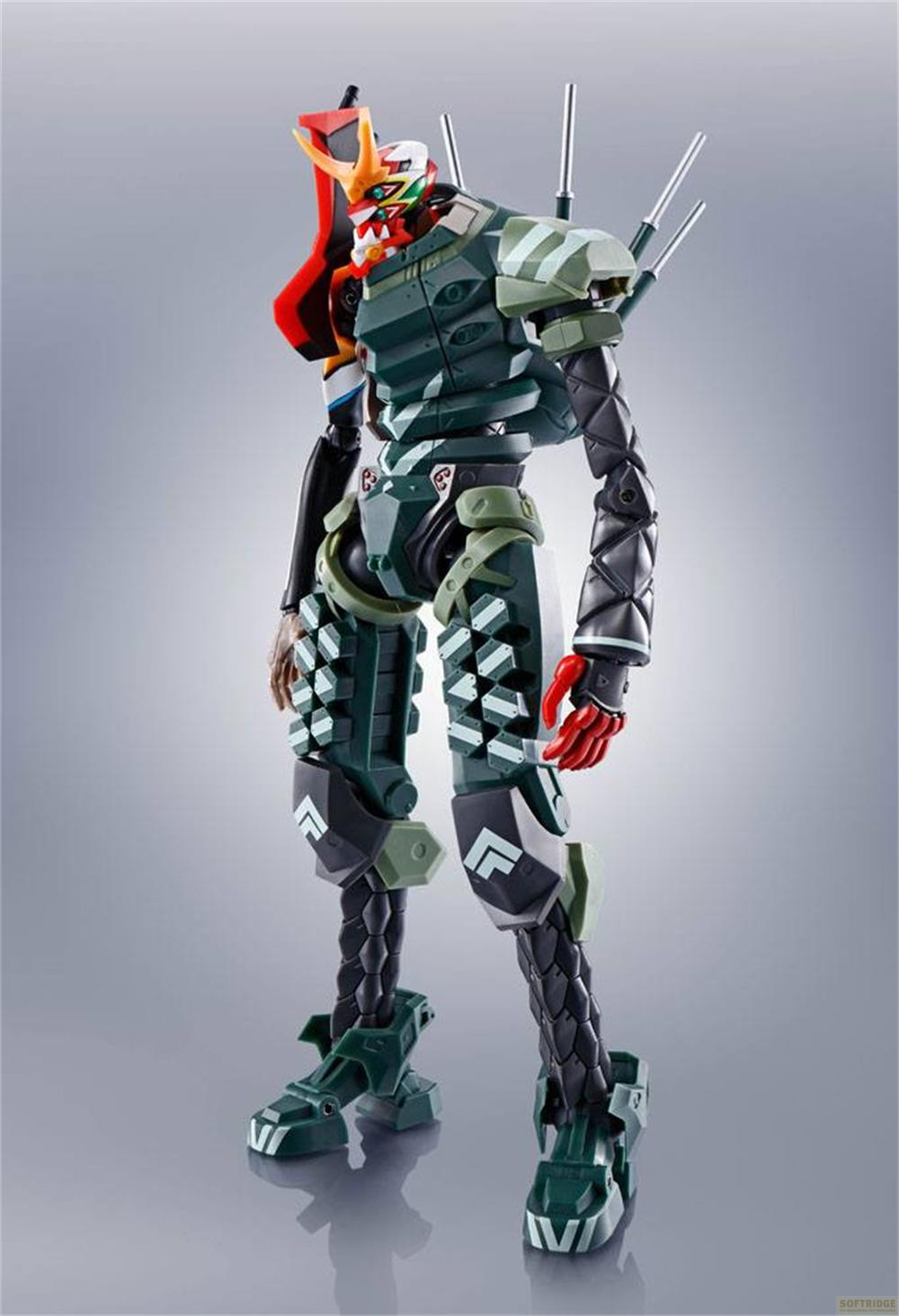 Robot verde con mani rosse e testa colorata su sfondo grigio.