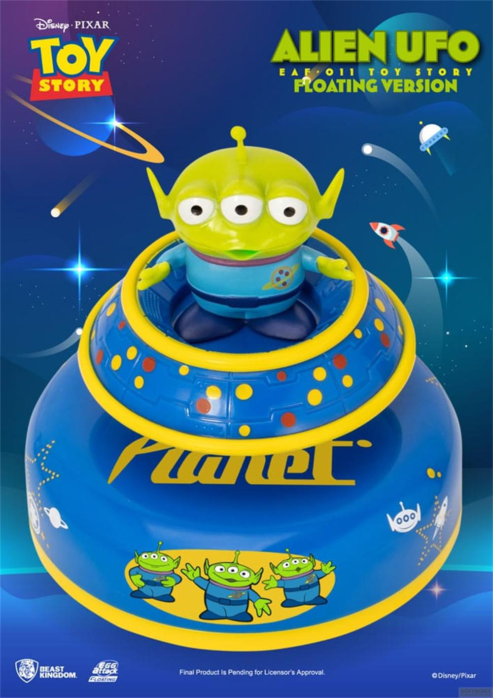 Ein grüner Alien-UFO-Spielzeug von Toy Story schwebt in einem blauen UFO-förmigen Behälter.