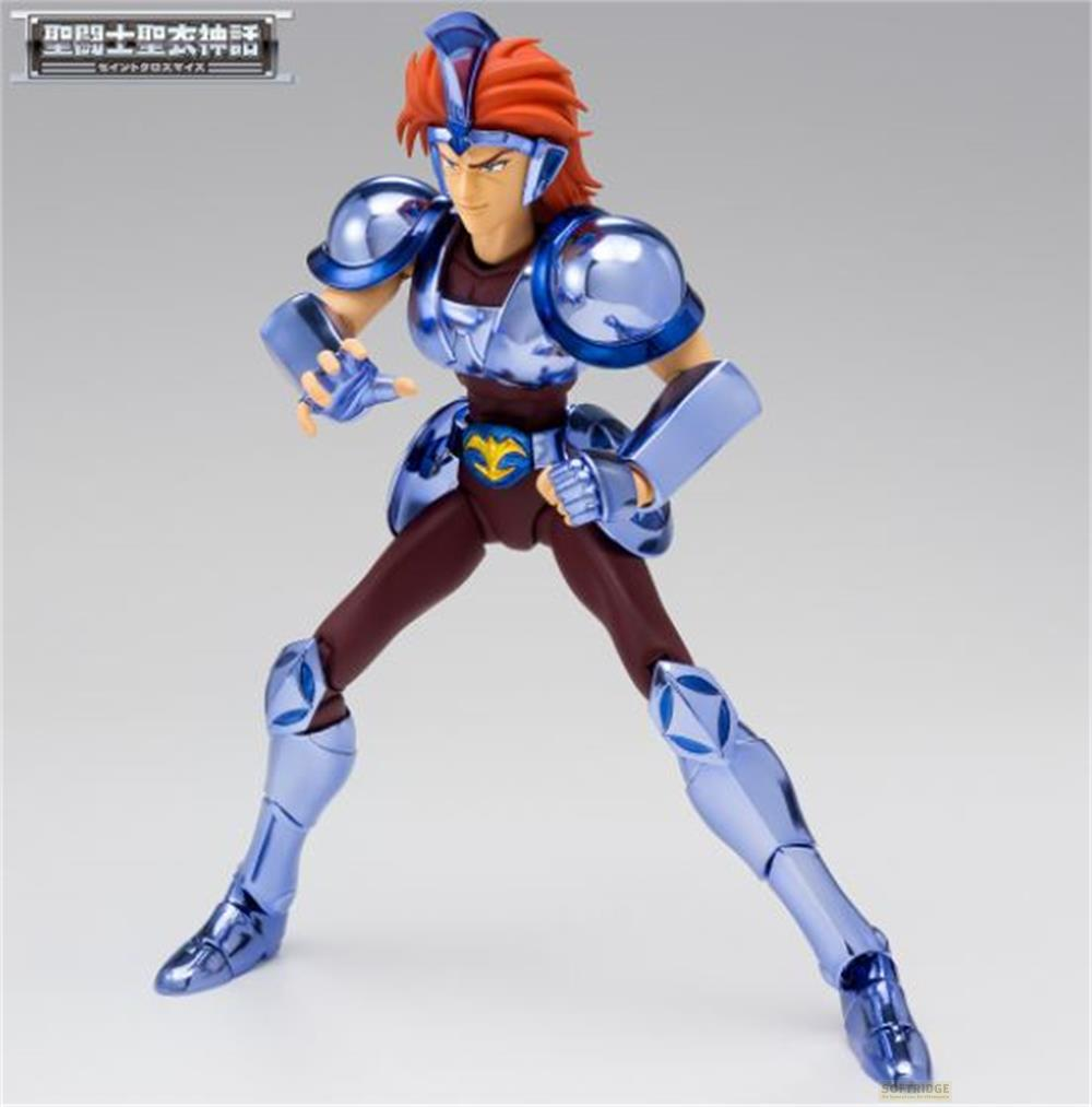 Una figura in armatura blu con capelli rossi in posa da combattimento.