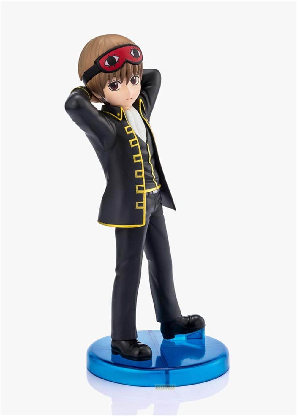 Figur eines Anime-Charakters in schwarzem Anzug mit gelber Verzierung und roter Schlafmaske.