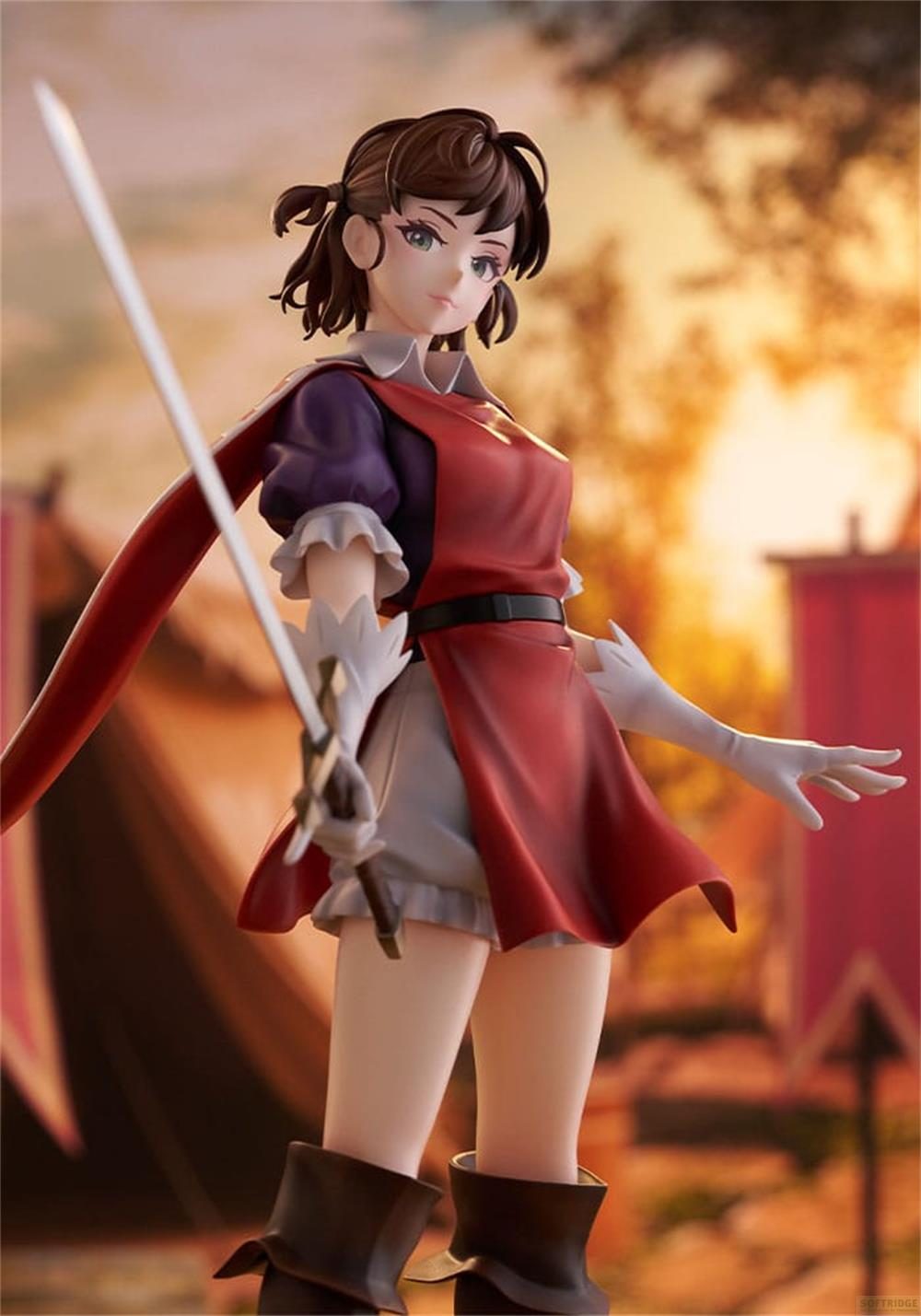 Eine Figur mit braunen Zöpfen hält ein Schwert, trägt ein rotes Cape und eine Weste.