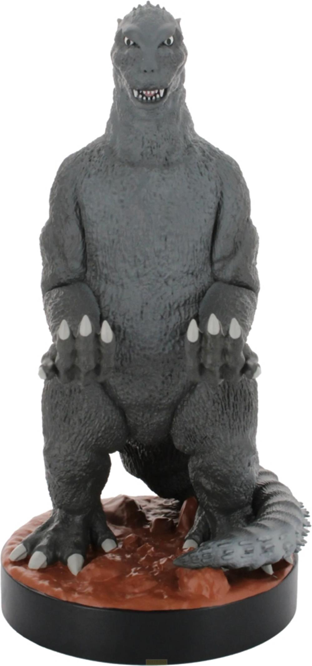 Graue Godzilla-Figur auf braunem Felsen-Sockel, weißer Hintergrund.