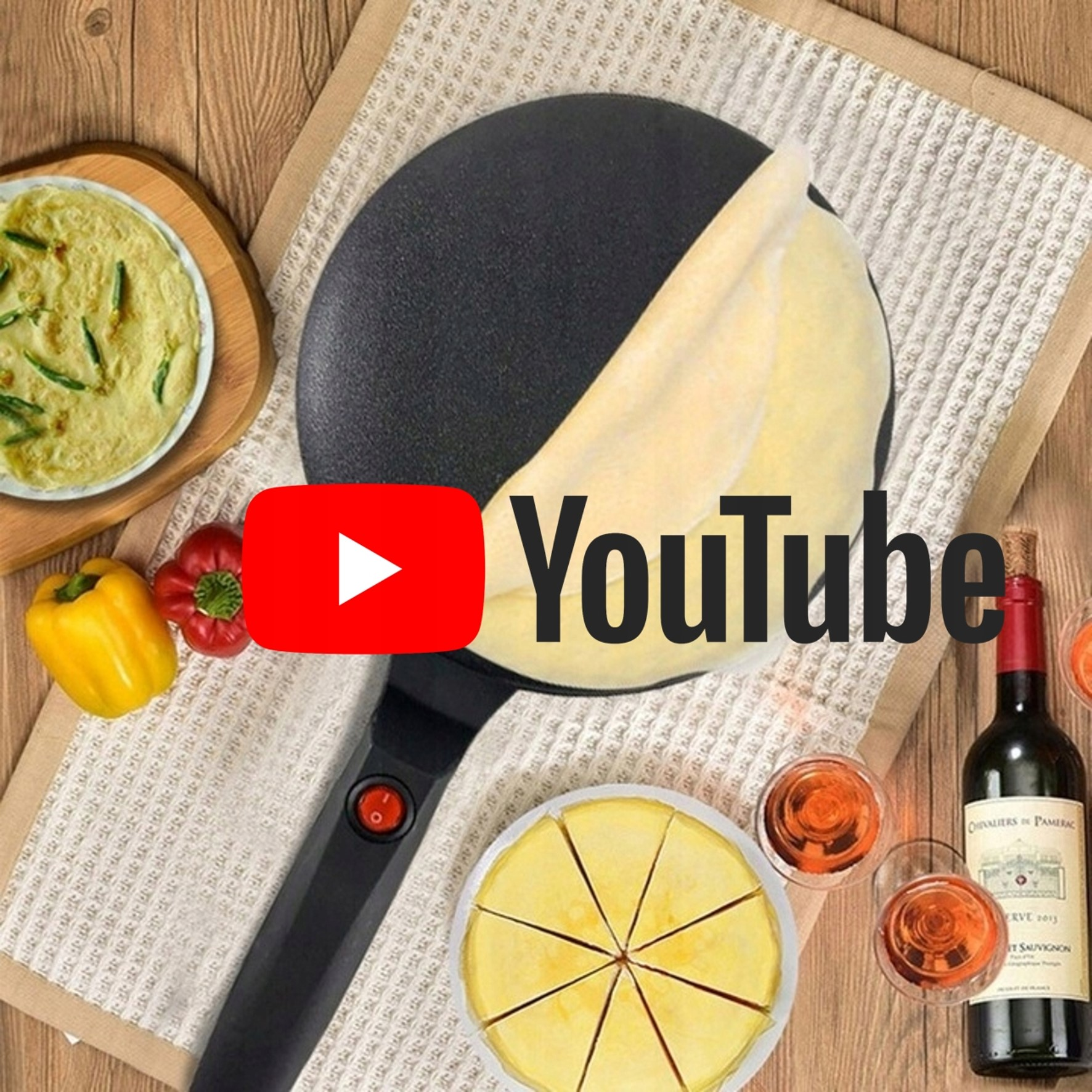 Maszyna do naleśników z naleśnikami, papryką, winem i kieliszkami na drewnianym stole.