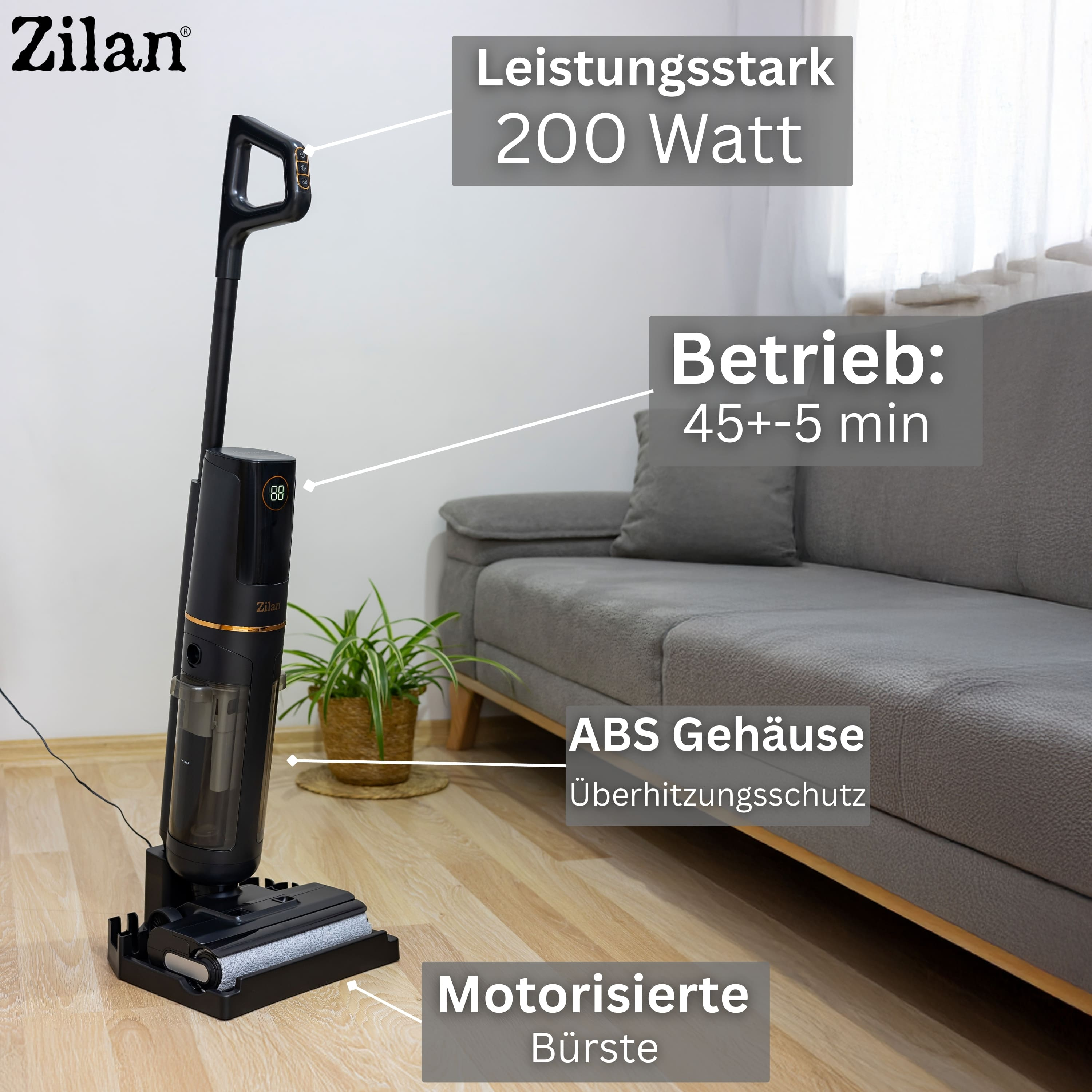 Czarny czyścik podłogowy Zilan z cyfrowym wyświetlaczem stoi na drewnianej podłodze obok kanapy.