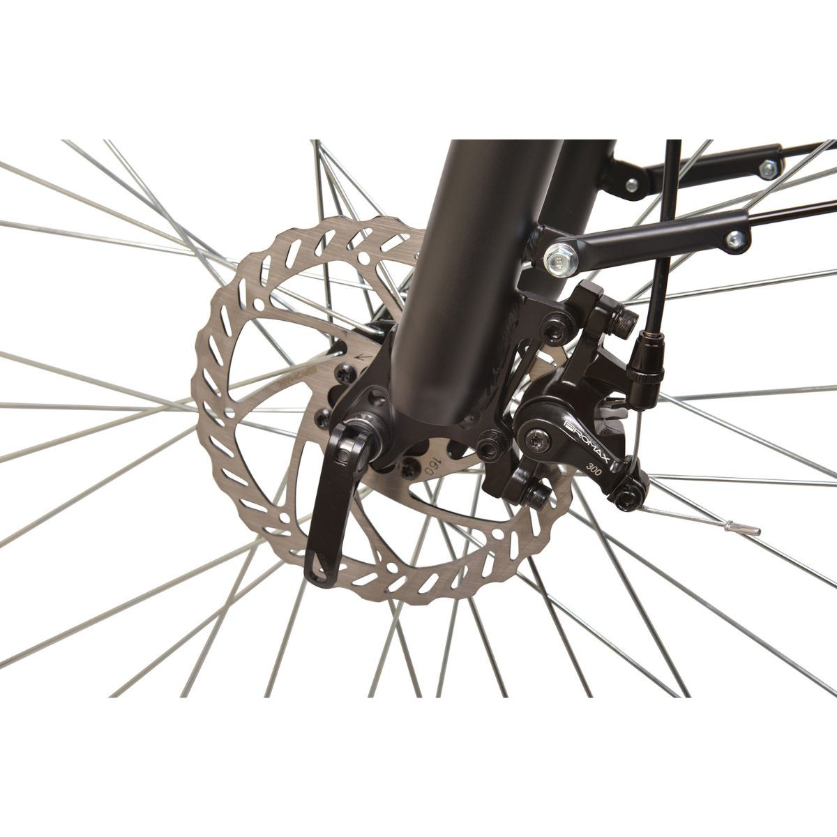 Zbliżenie hamulca tarczowego roweru ze szprychami i widelcem.