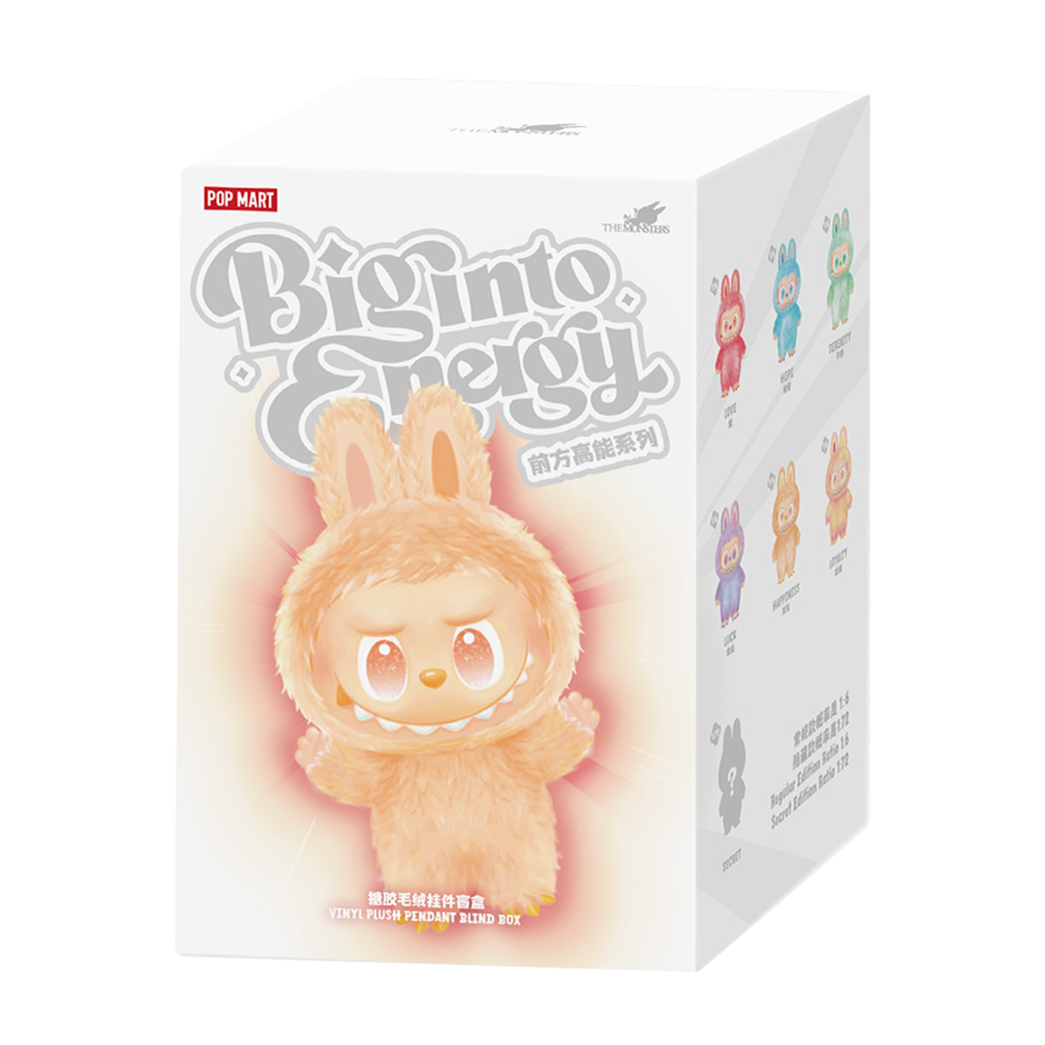 Jouet lapin en peluche orange sur boîte, avec marque 'Big Into Energy'.
