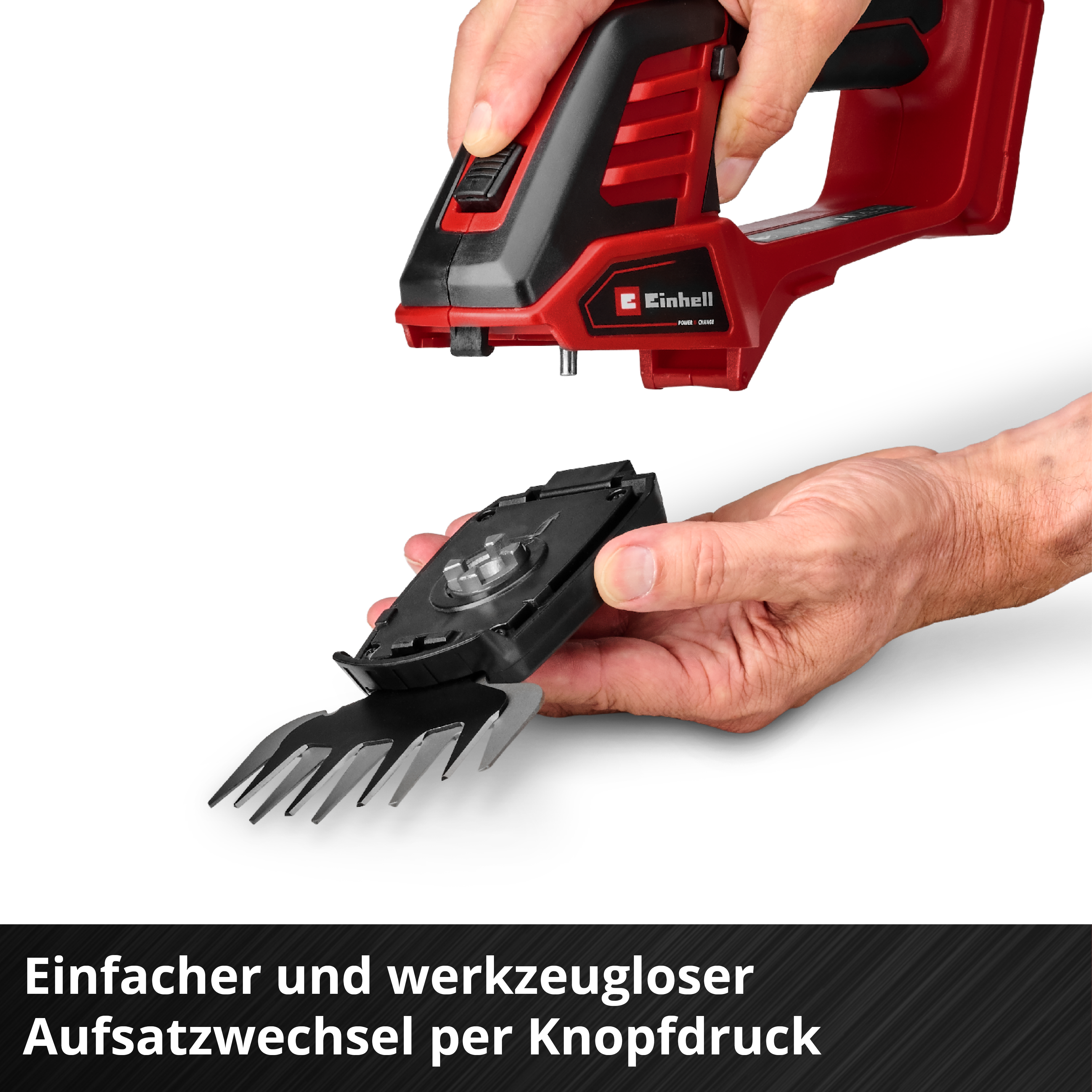 Hände wechseln ein rot-schwarzes Gartengerät mit einem Aufsatz.