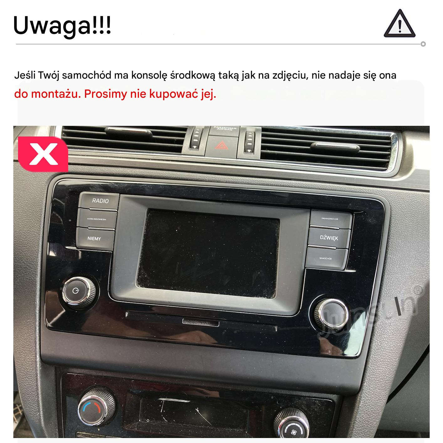 Deska rozdzielcza samochodu z radiem i nawiewami, czerwony symbol X.
