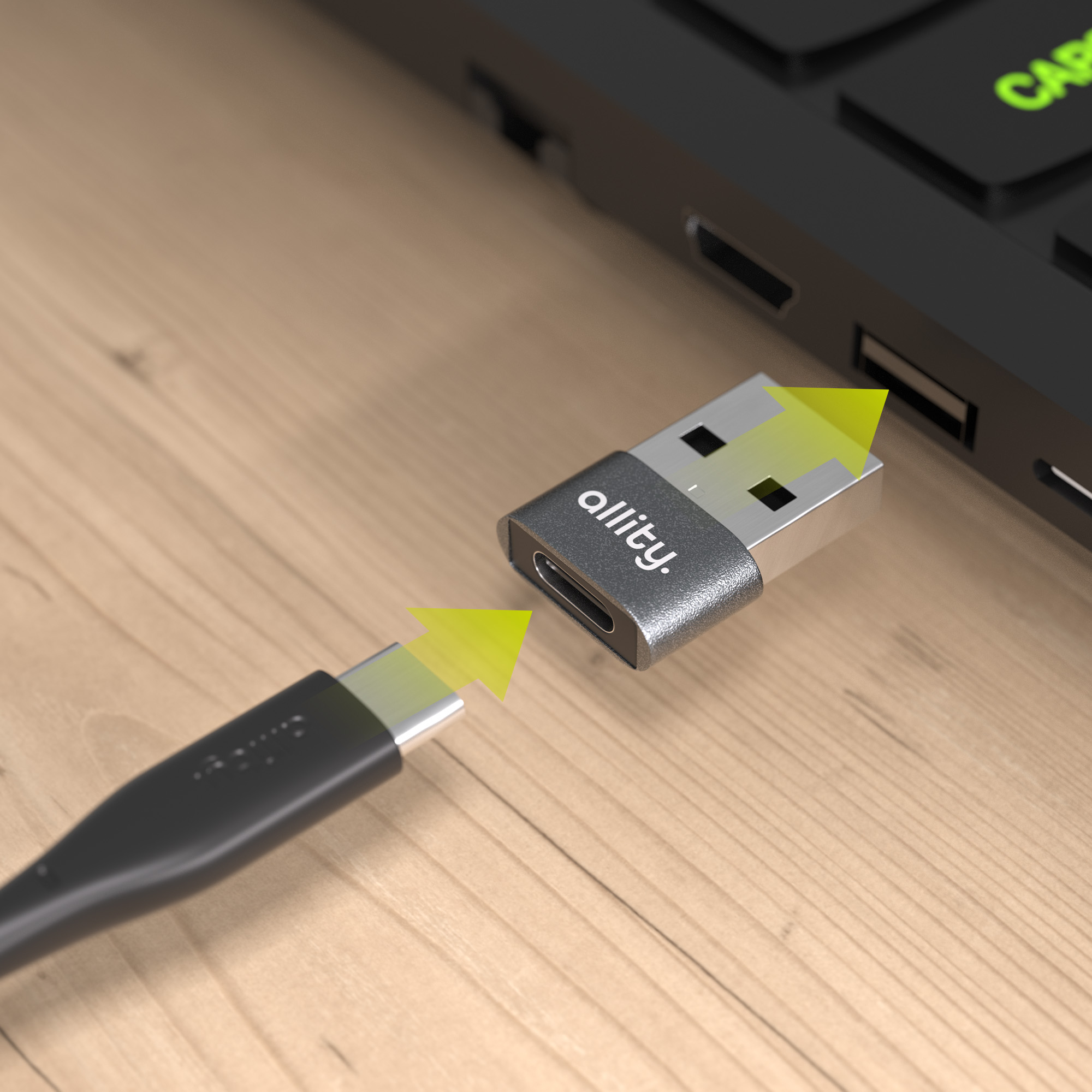 Kabel USB-C podłączany do adaptera podłączonego do laptopa.