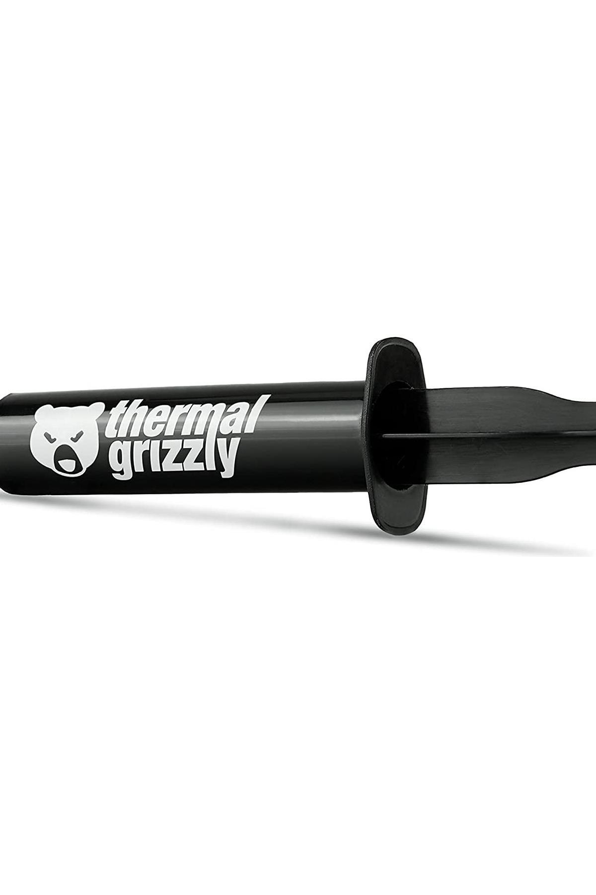 Aplicador negro con logo blanco "thermal grizzly" y cabeza de oso.