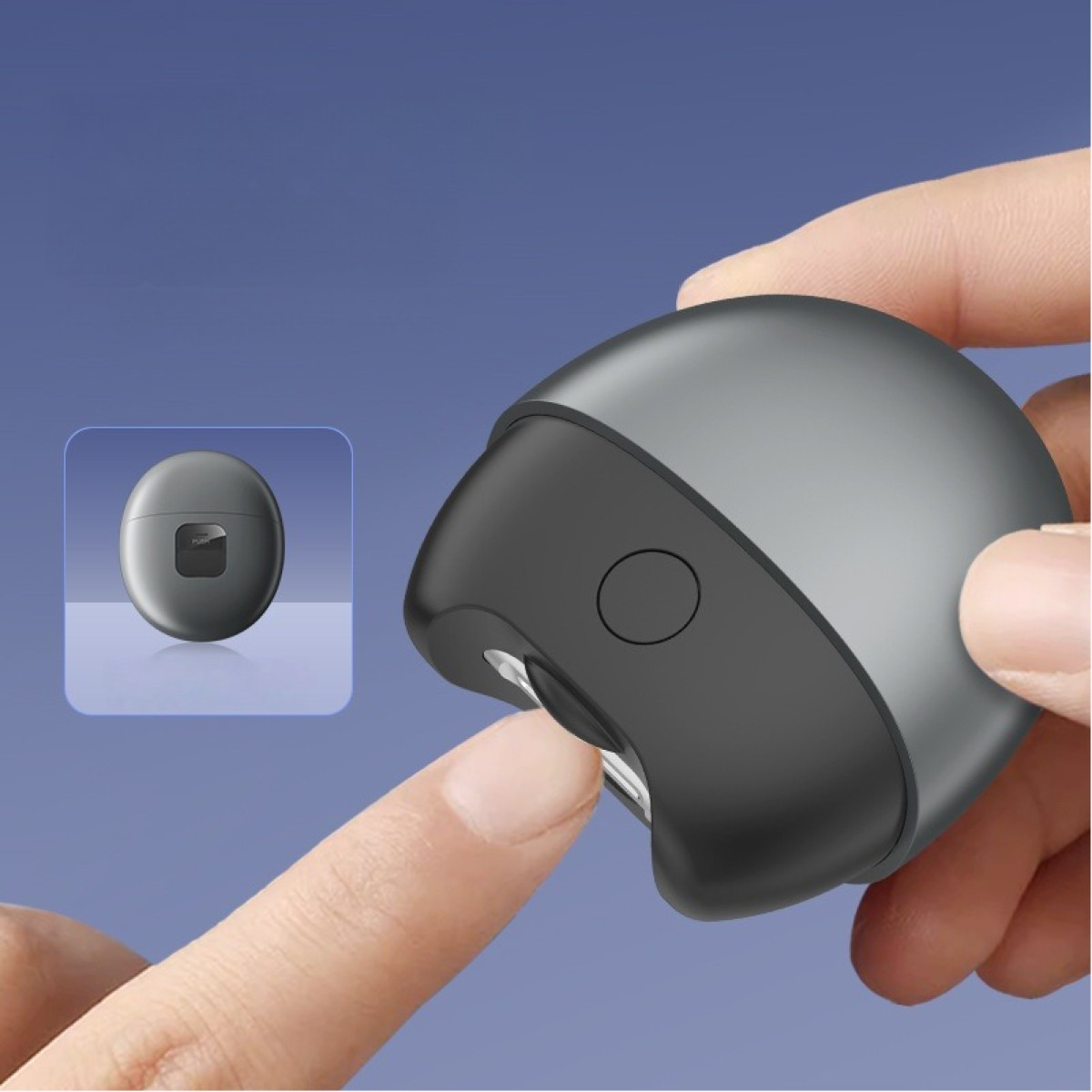 Szary elektryczny obcinacz do paznokci dla niemowląt obsługiwany palcem.