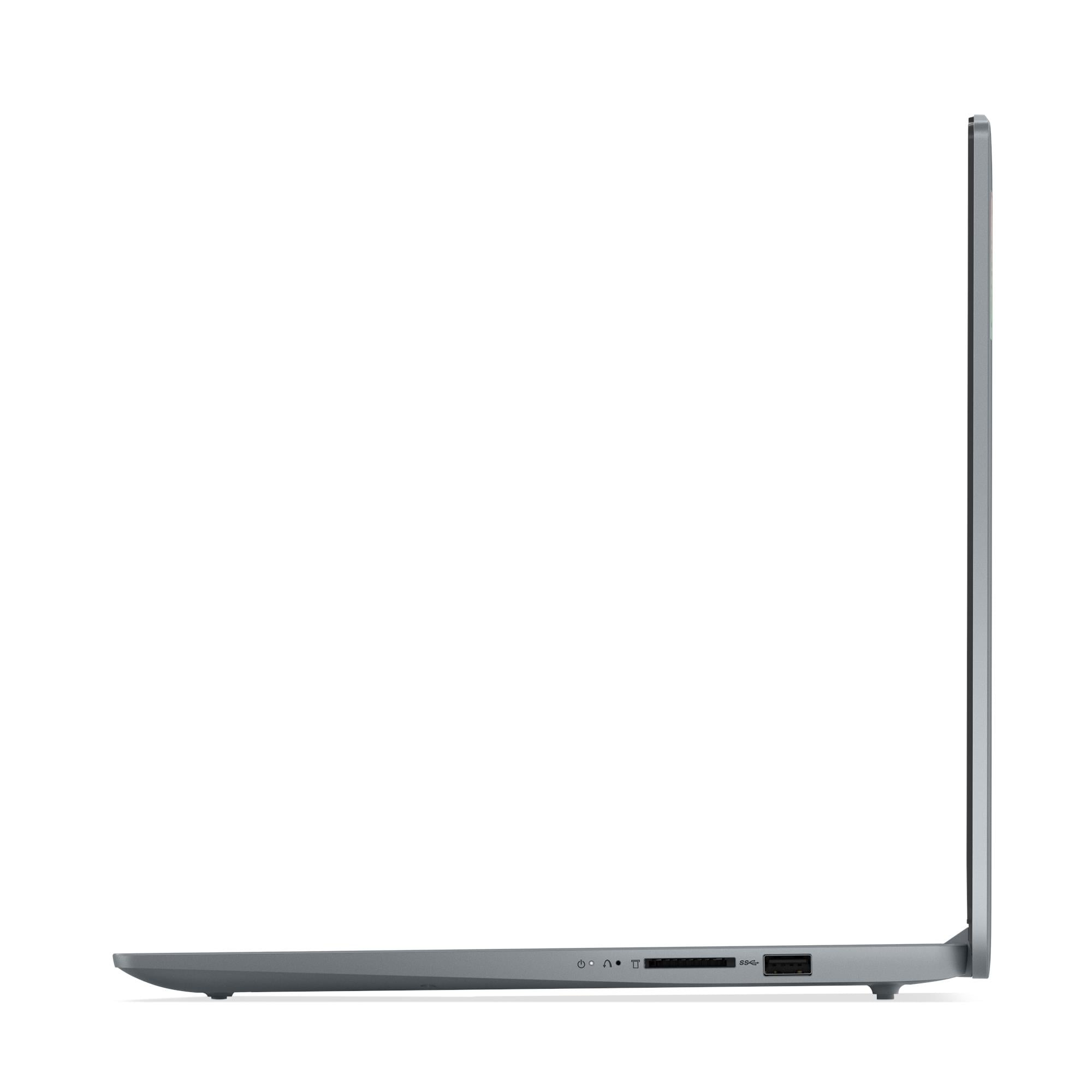 Laptop grigio visto di lato, con porte visibili sul bordo.