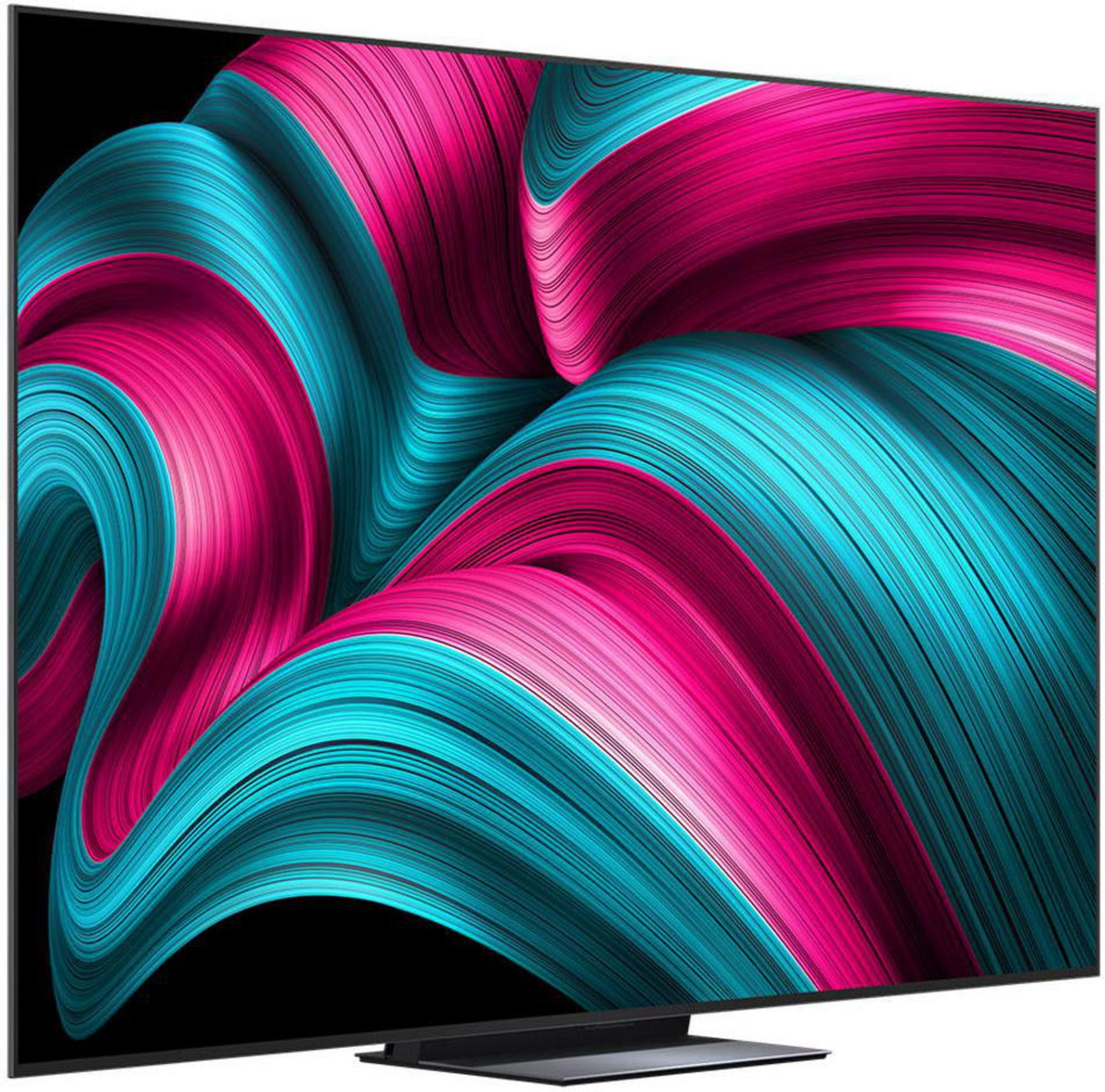 Ein moderner Fernseher mit einem abstrakten, geschwungenen Muster in Pink und Türkis.