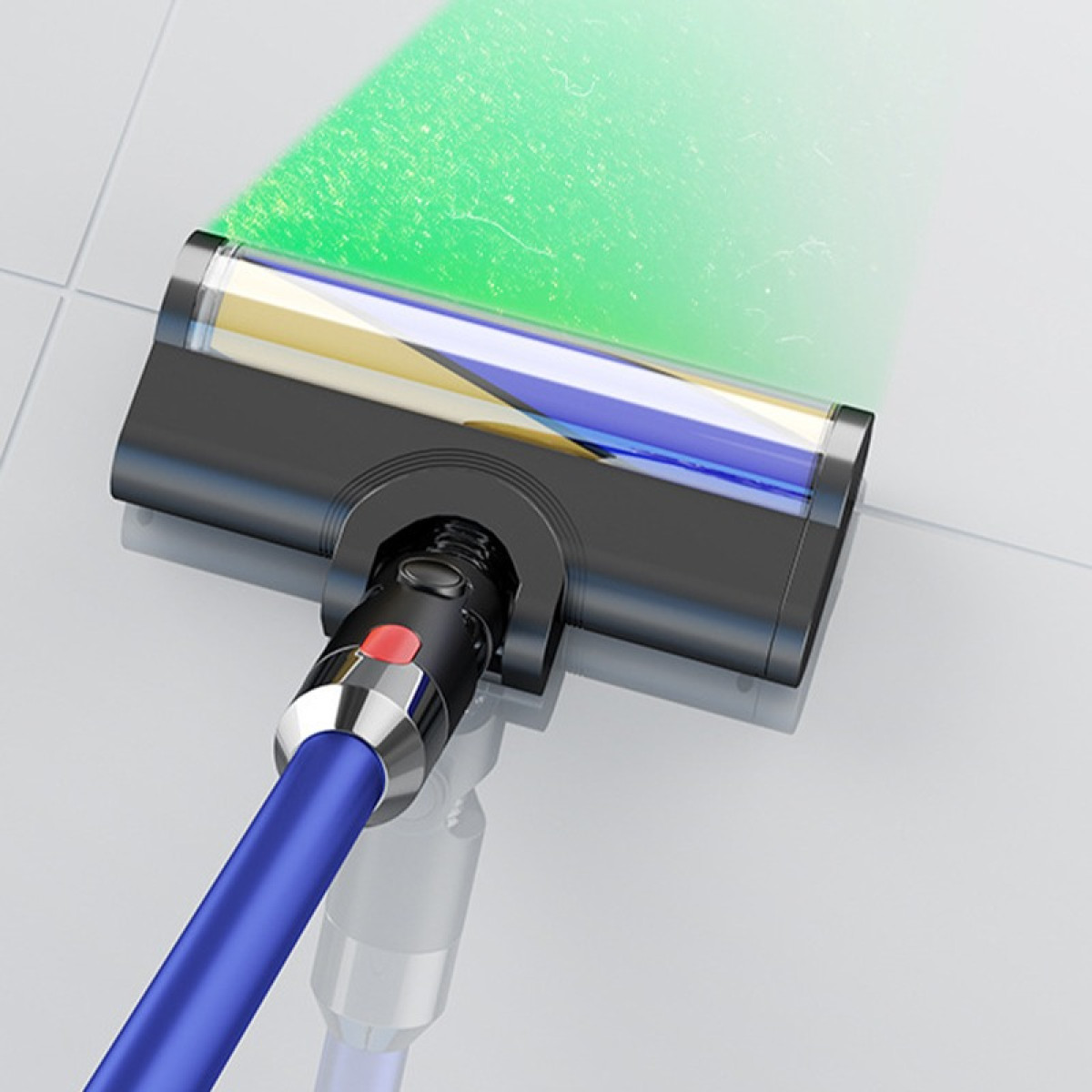 Zbliżenie głowicy odkurzacza na białej kafelkowej podłodze, z zieloną wiązką światła podkreślającą cząsteczki kurzu.