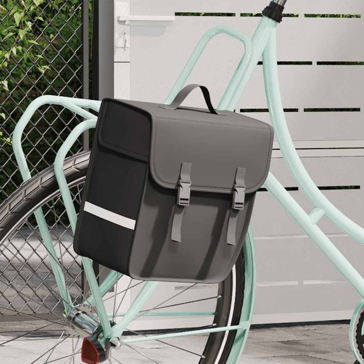 Graue Fahrradtasche mit reflektierendem Streifen auf einem mintgrünen Fahrrad.