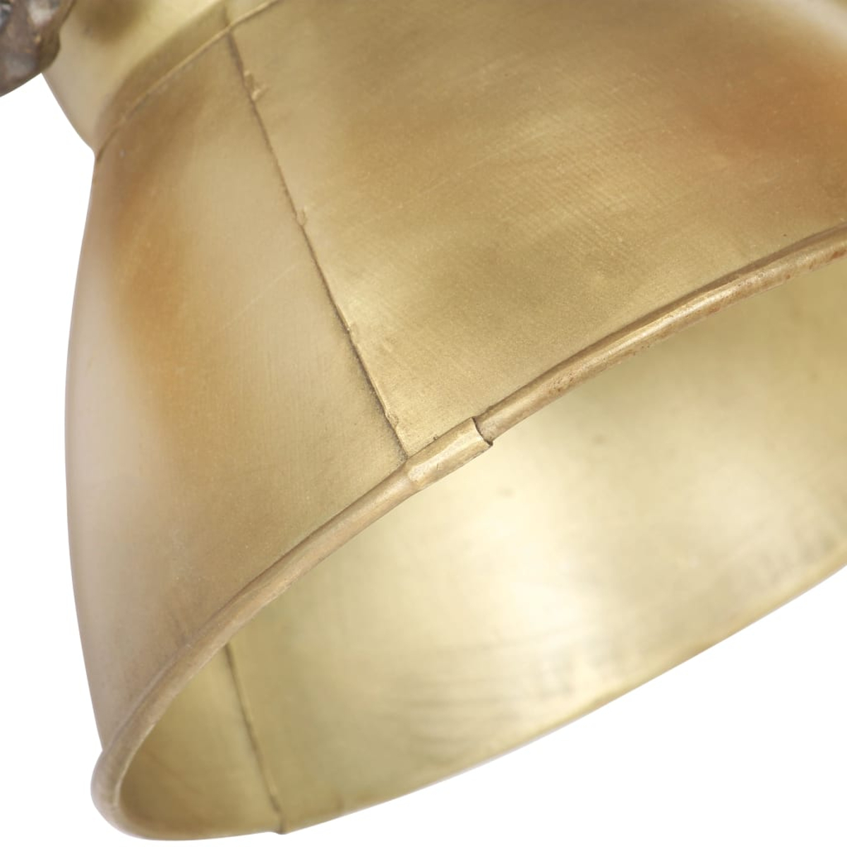 Nahaufnahme eines goldenen Lampenschirms mit sichtbaren Nähten.