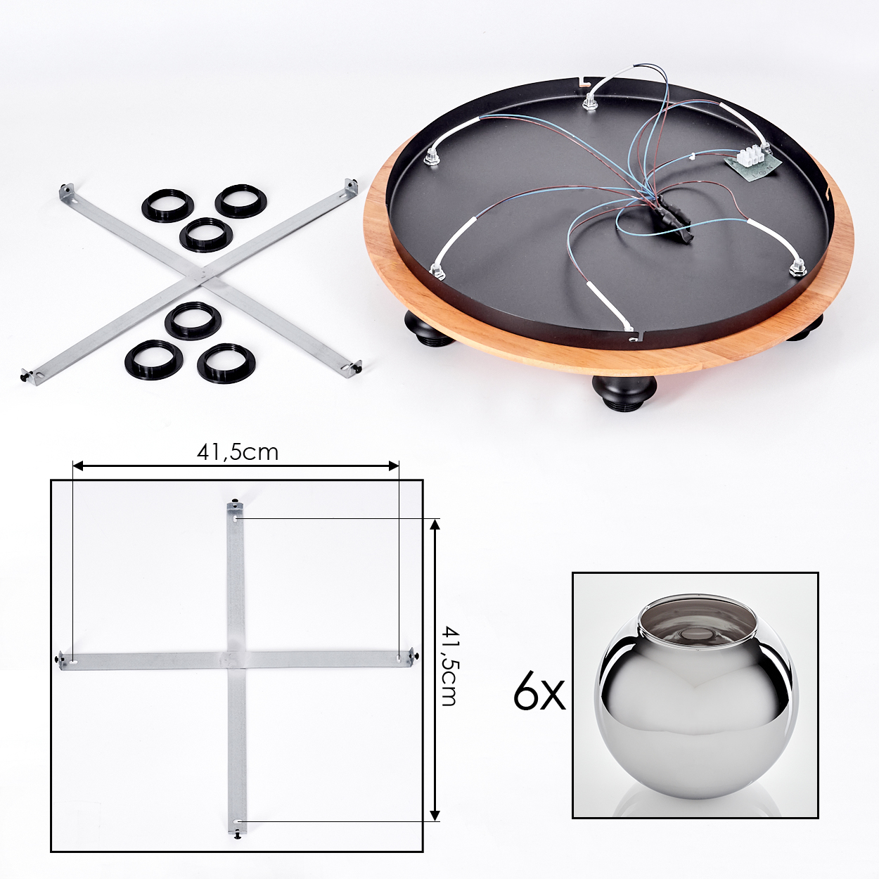 Teile für eine Deckenleuchte: Metallkreuz, Ringe, Holzsockel, Kabel und Glaskugel.