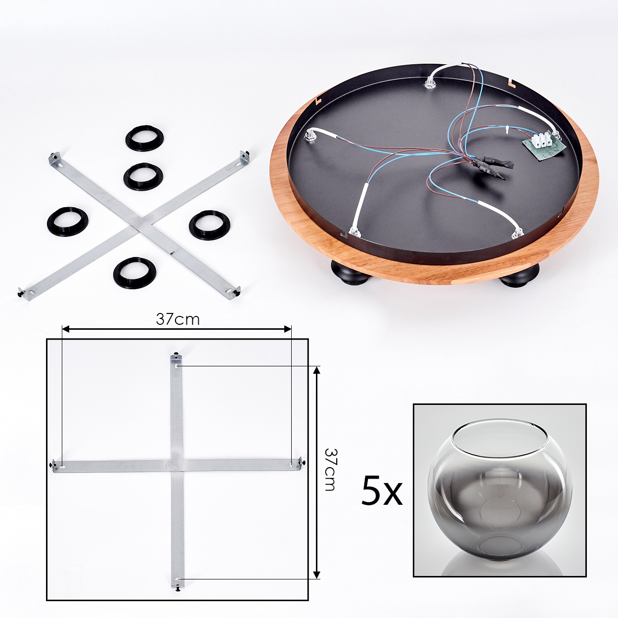 Ein runder Holzteller mit Drähten und eine Tic-Tac-Toe-Vorrichtung mit Ringen.