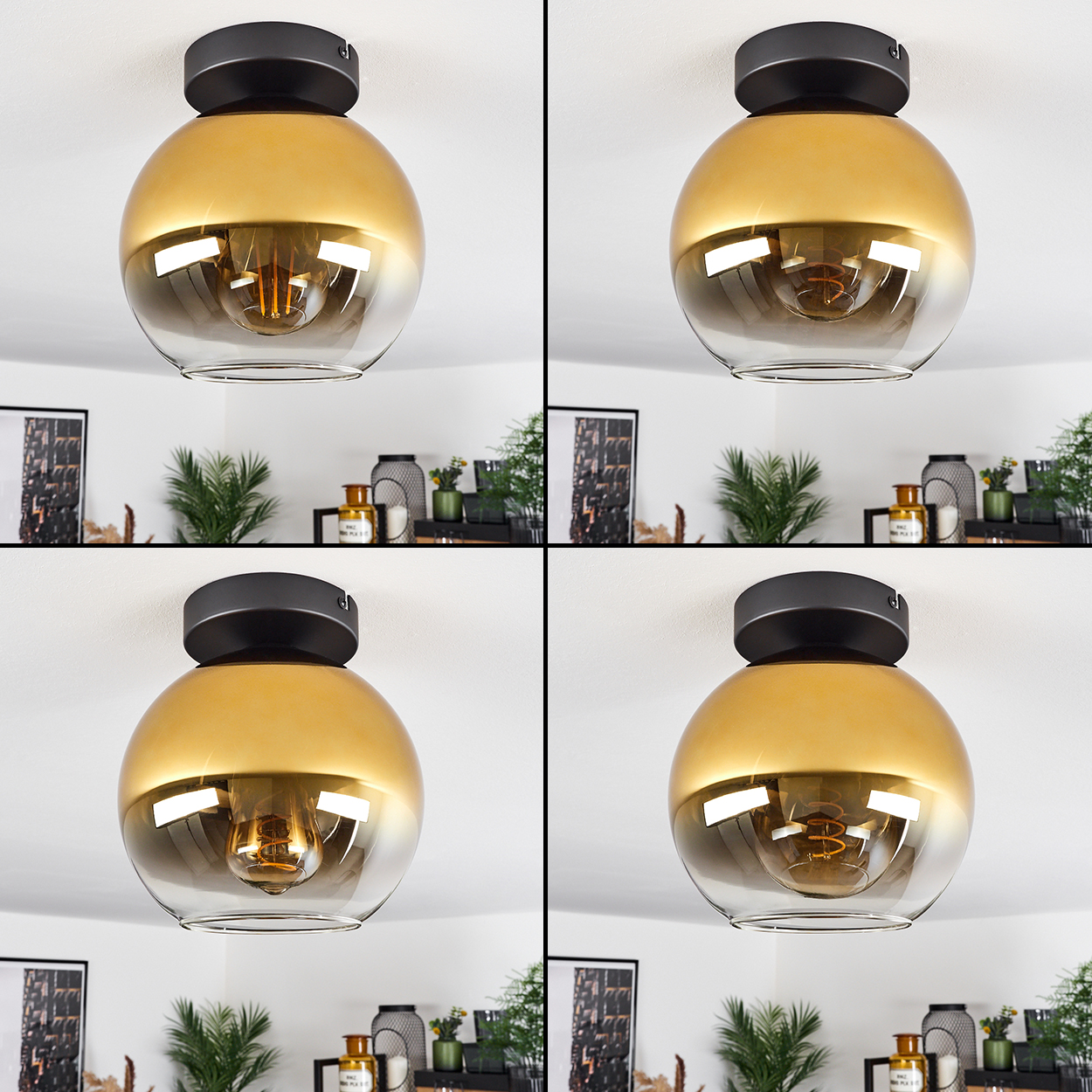 Eine goldene und klare Glaskugel-Deckenleuchte mit schwarzem Sockel.
