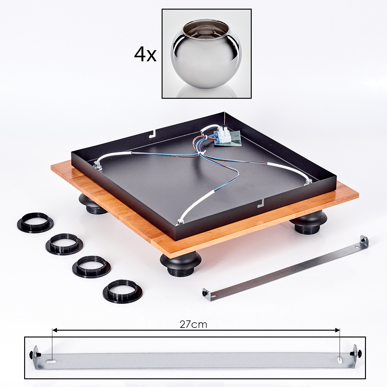 Teile eines Plattenspielers, mit Holzsockel, Metallchassis und Füßen.
