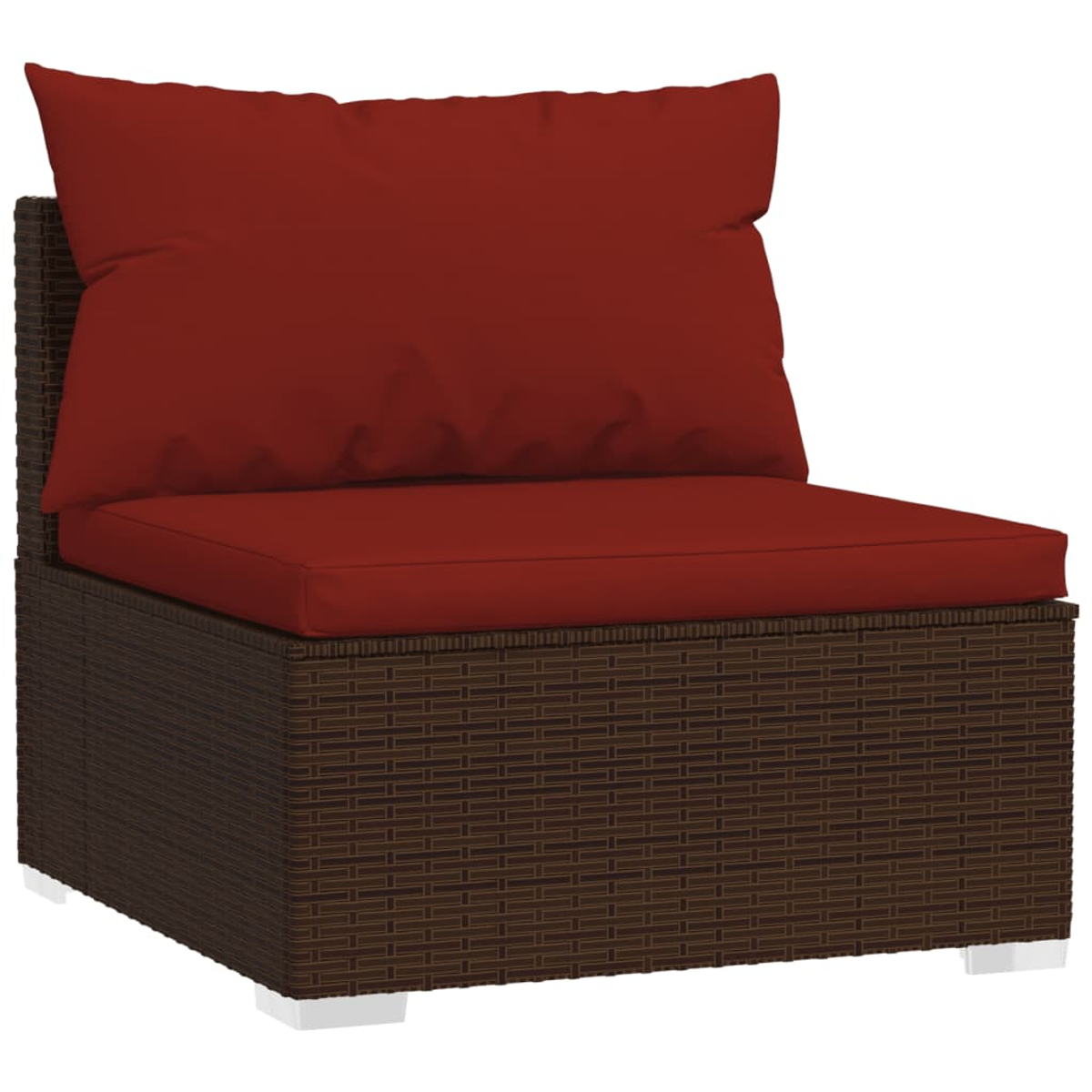 Una poltrona in rattan marrone con cuscini rossi e un grande cuscino schienale.