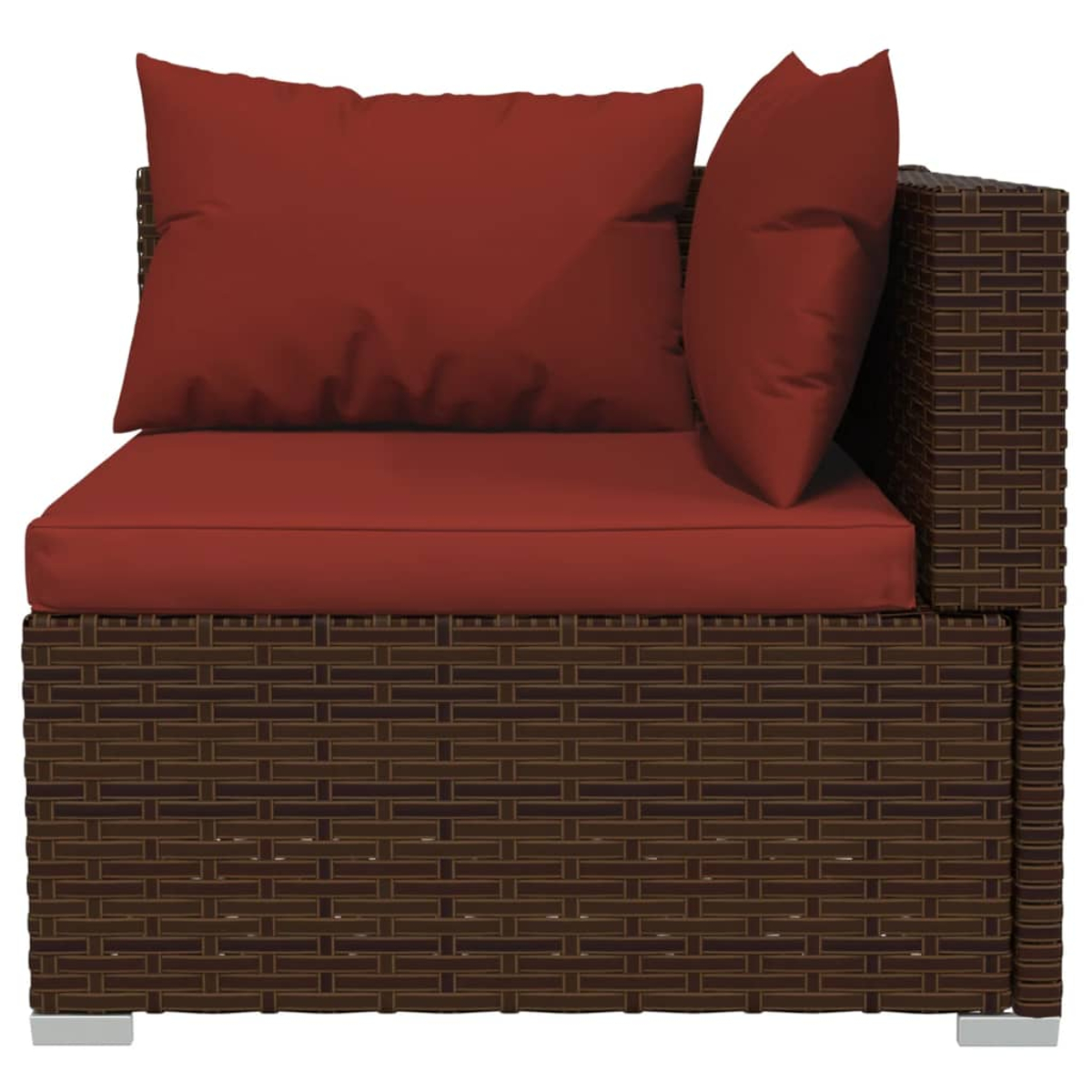 Poltrona angolare in rattan marrone con cuscini rossi.