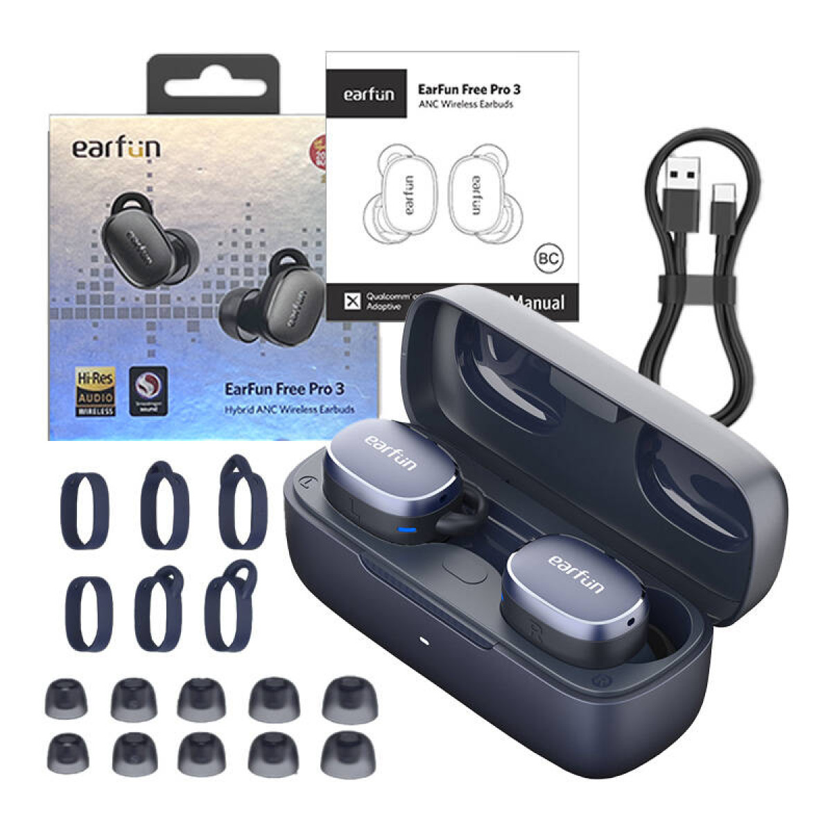 Auricolari EarFun Free Pro 3 con custodia di ricarica, accessori e cavo su sfondo bianco.