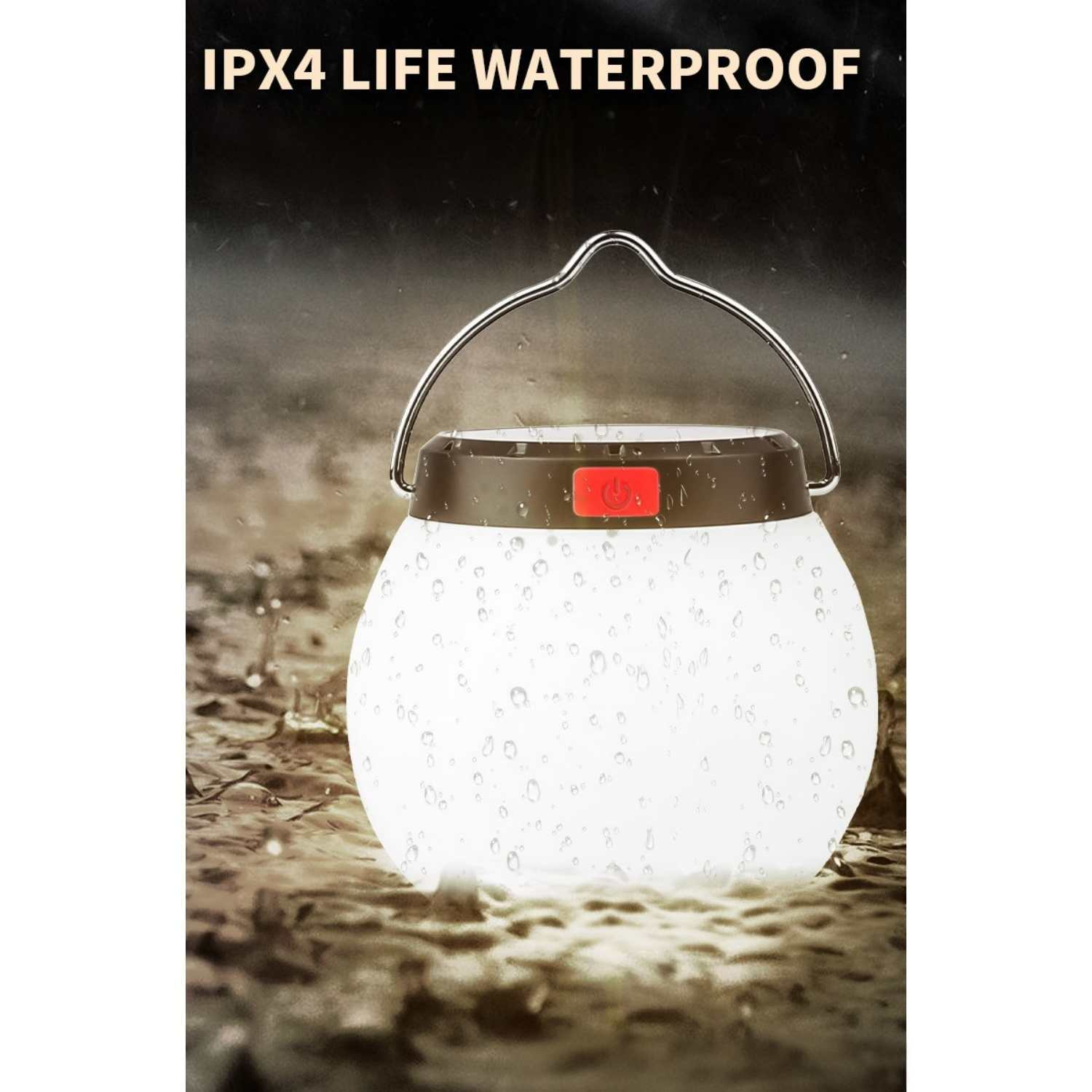 Eine leuchtende, weiße Laterne mit rotem Knopf im Regen. IPX4 wasserdicht.