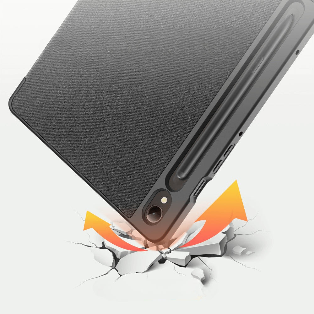 Schwarzes Tablet mit Stifthalter stürzt ab und bricht weißen Boden.