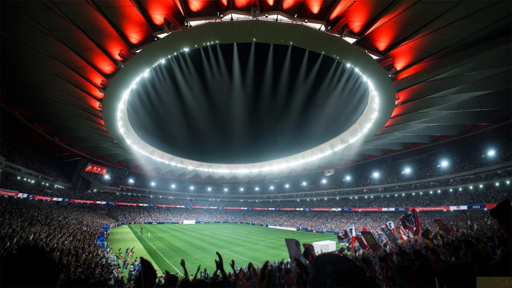 Uno stadio di calcio illuminato con spettatori, campo verde e vuoto.