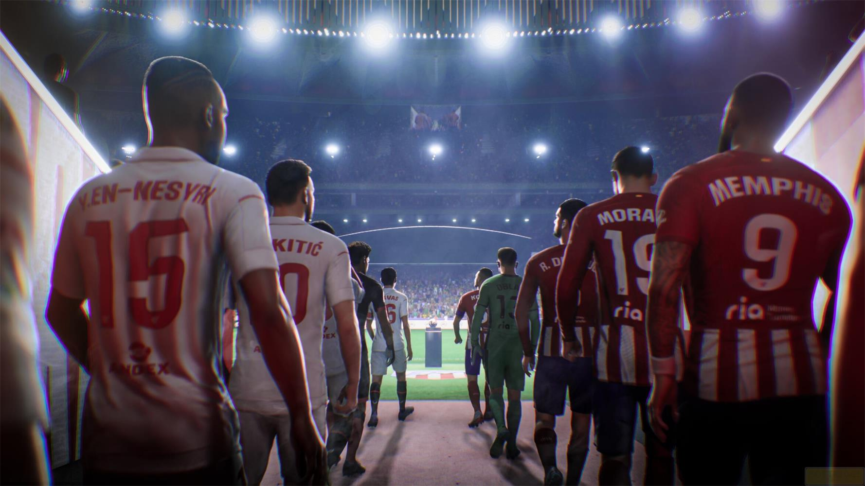 Giocatori di calcio entrano in uno stadio da un tunnel, illuminati da luci.