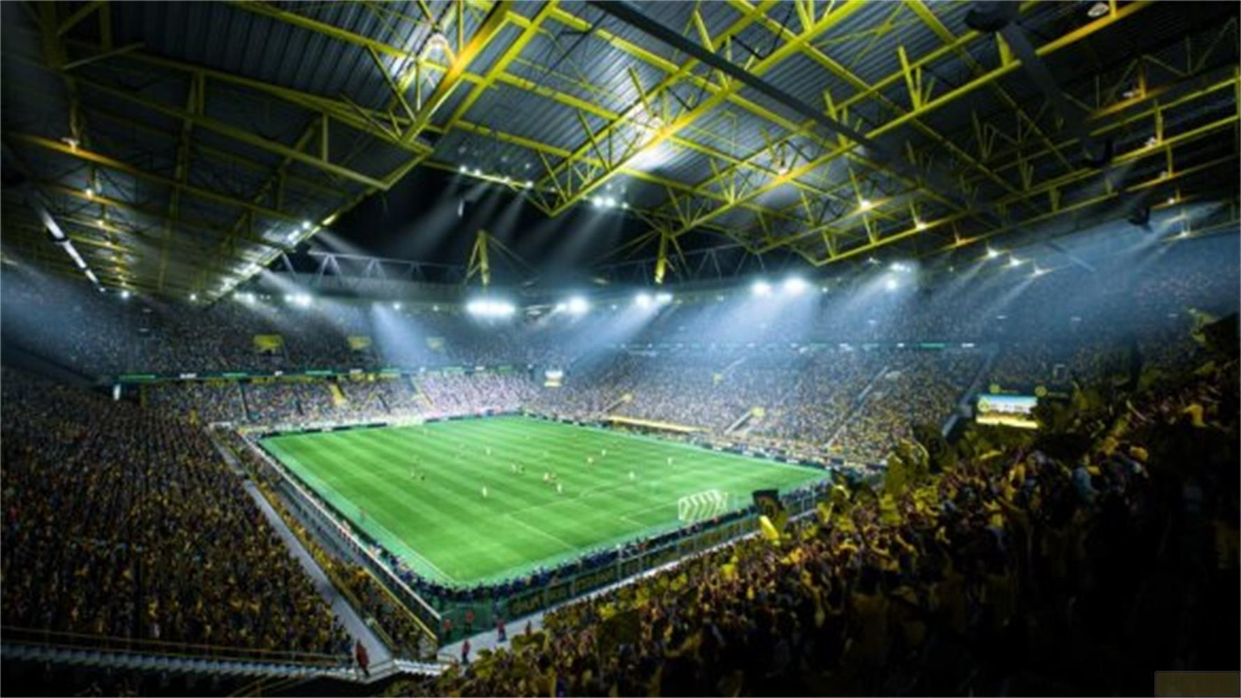 Uno stadio di calcio pieno con una struttura del tetto gialla e un campo illuminato.