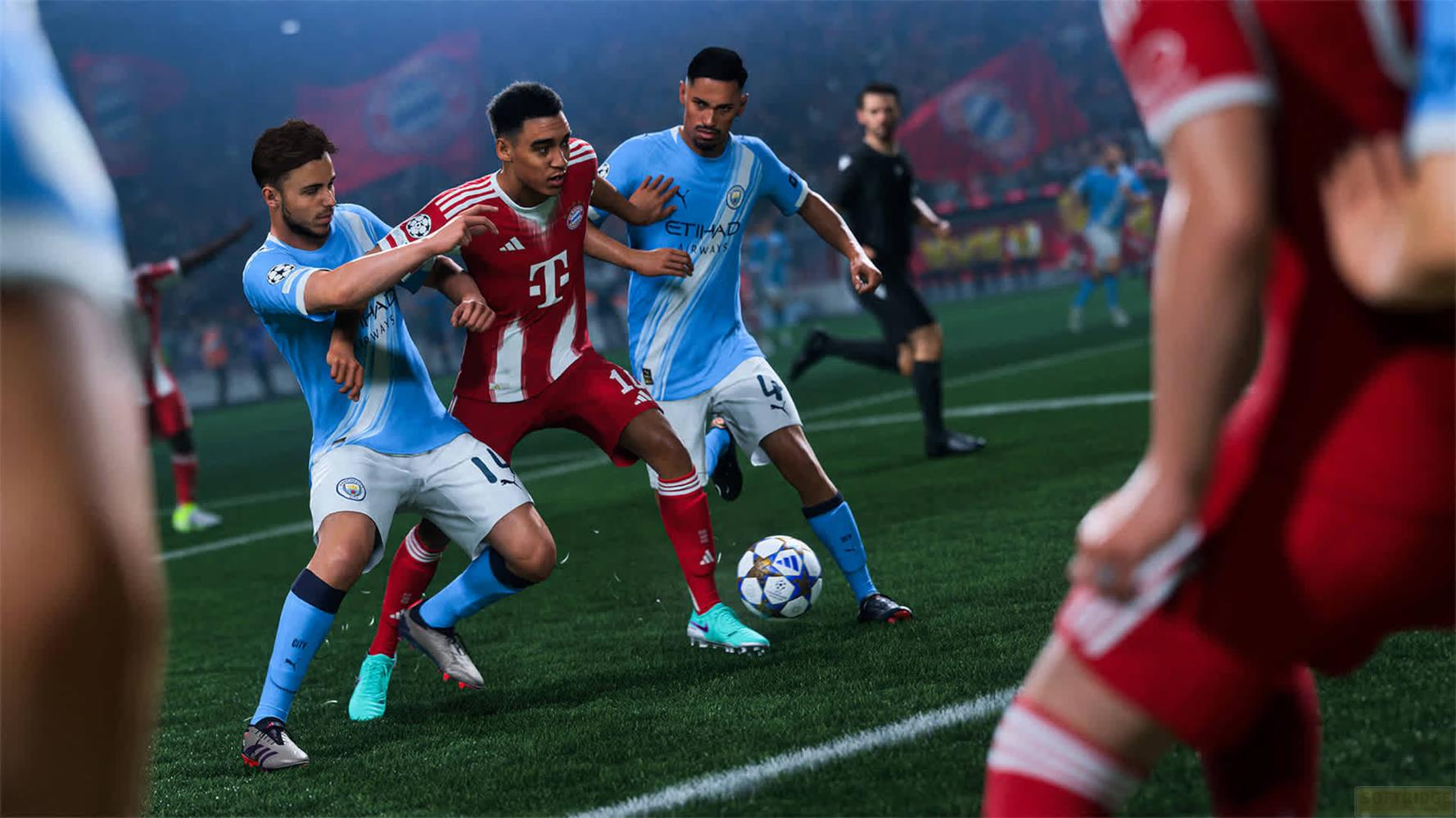 Calciatori in maglia blu e rossa lottano per il pallone su un campo d'erba.