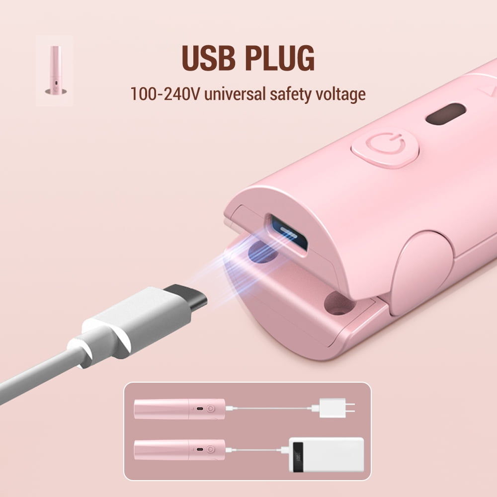 Ein rosa USB-C-Kabel wird in ein rosa Gerät gesteckt.