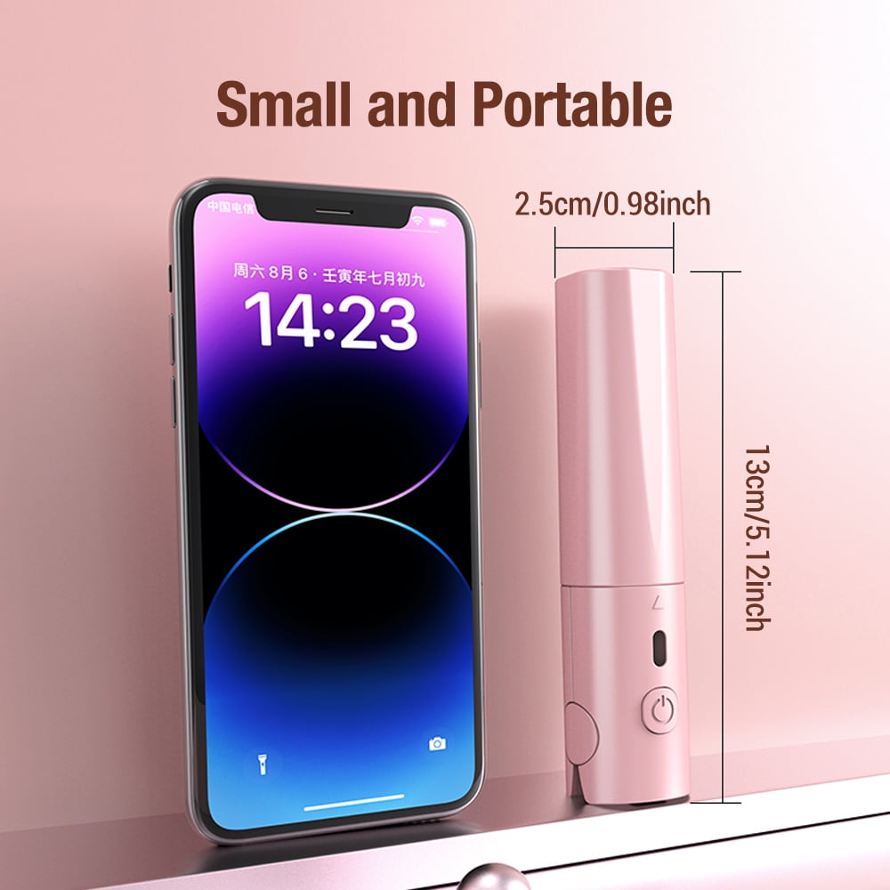 Ein rosa Make-up-Pinsel neben einem Smartphone, mit Maßen.