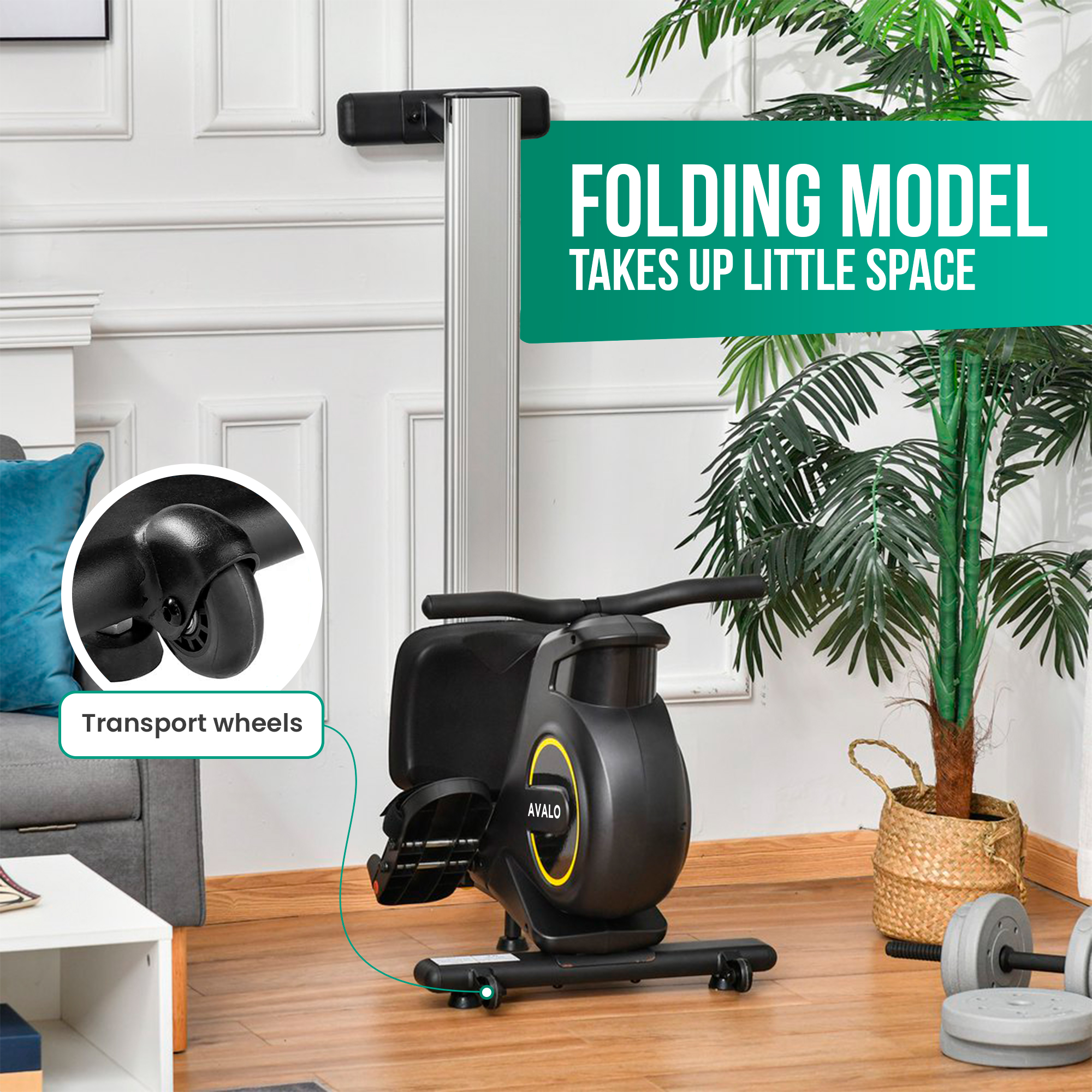 Black rowing machine with transport wheels, on a wooden floor.