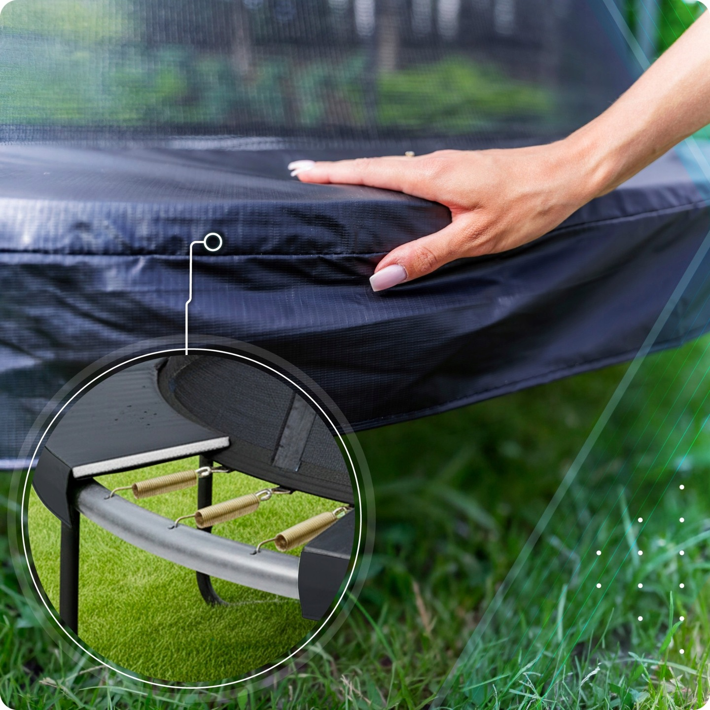 Dłoń na czarnym pokrowcu trampoliny, zbliżenie sprężyn