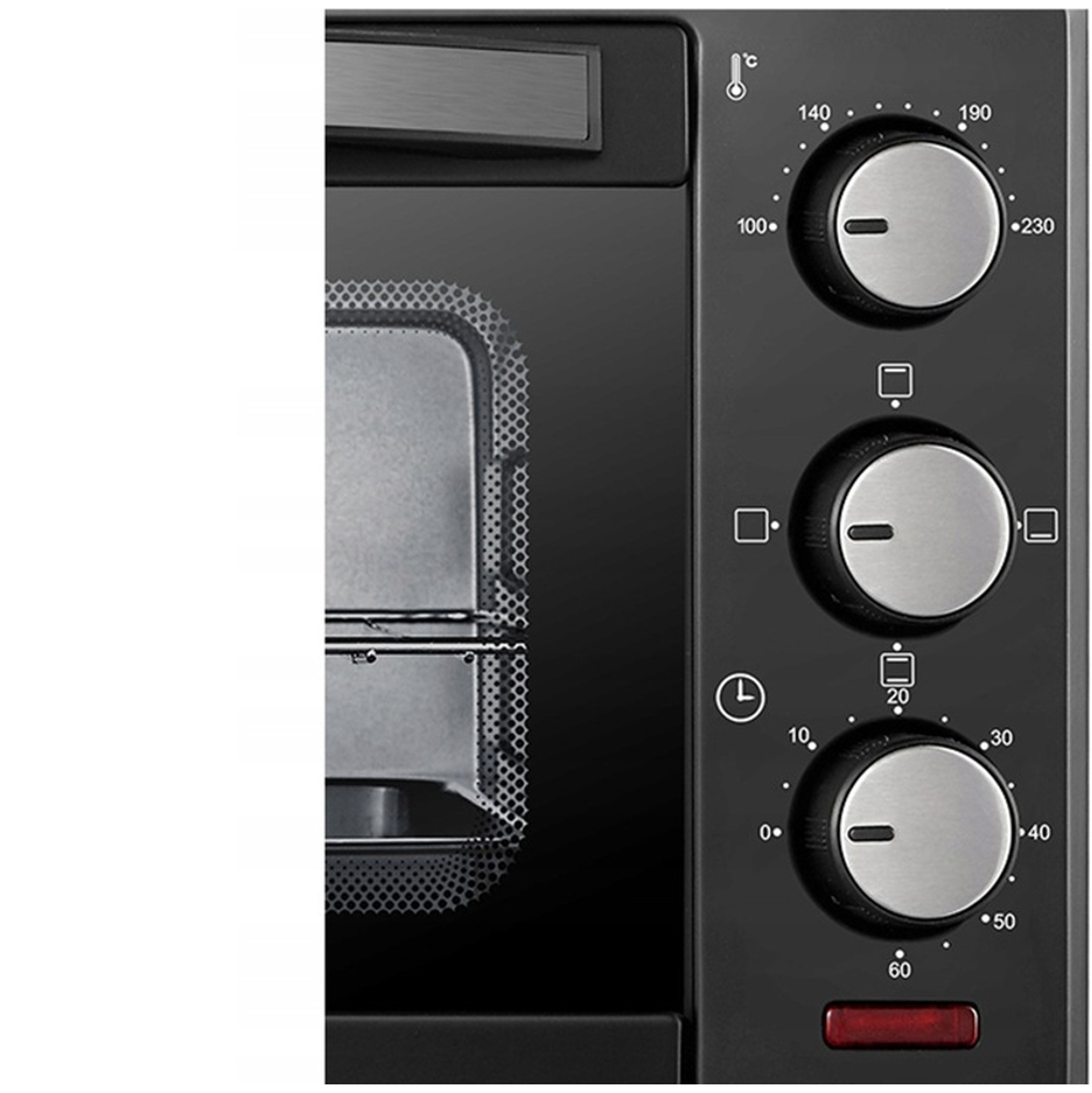 Zbliżenie czarnego piekarnika z trzema pokrętłami do temperatury, funkcji i czasu.