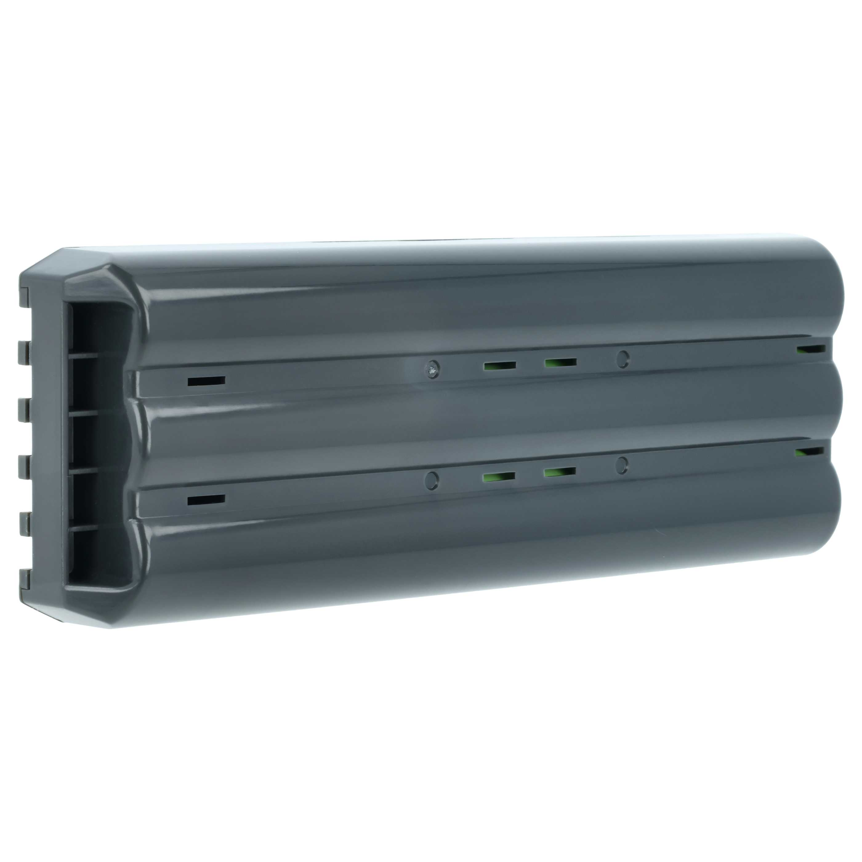 Graue Batteriepack mit Schlitzen und grünen Akzenten.